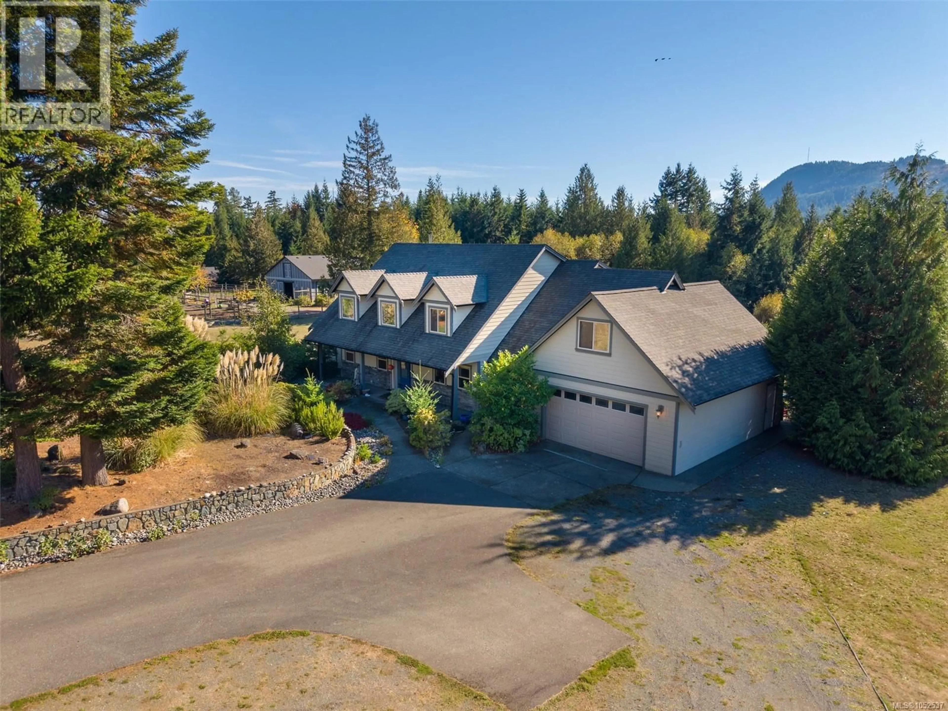 A pic from outside/outdoor area/front of a property/back of a property/a pic from drone, mountain view for 762 MEMORY LANE, Mill Bay British Columbia V0R2P4