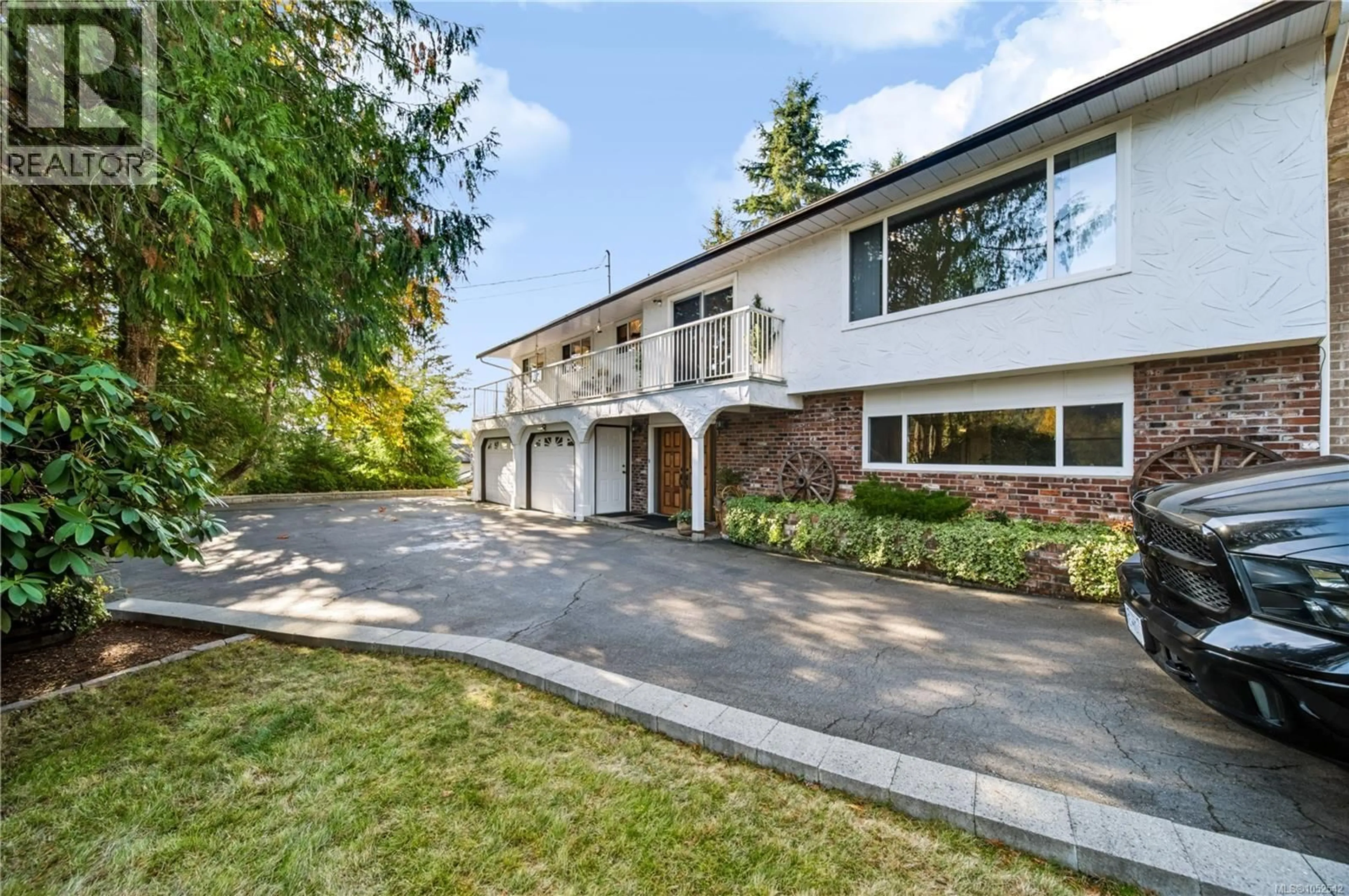 Home with brick exterior material, street for 1927 RICHARDSON ROAD, Nanaimo British Columbia V9X1C2