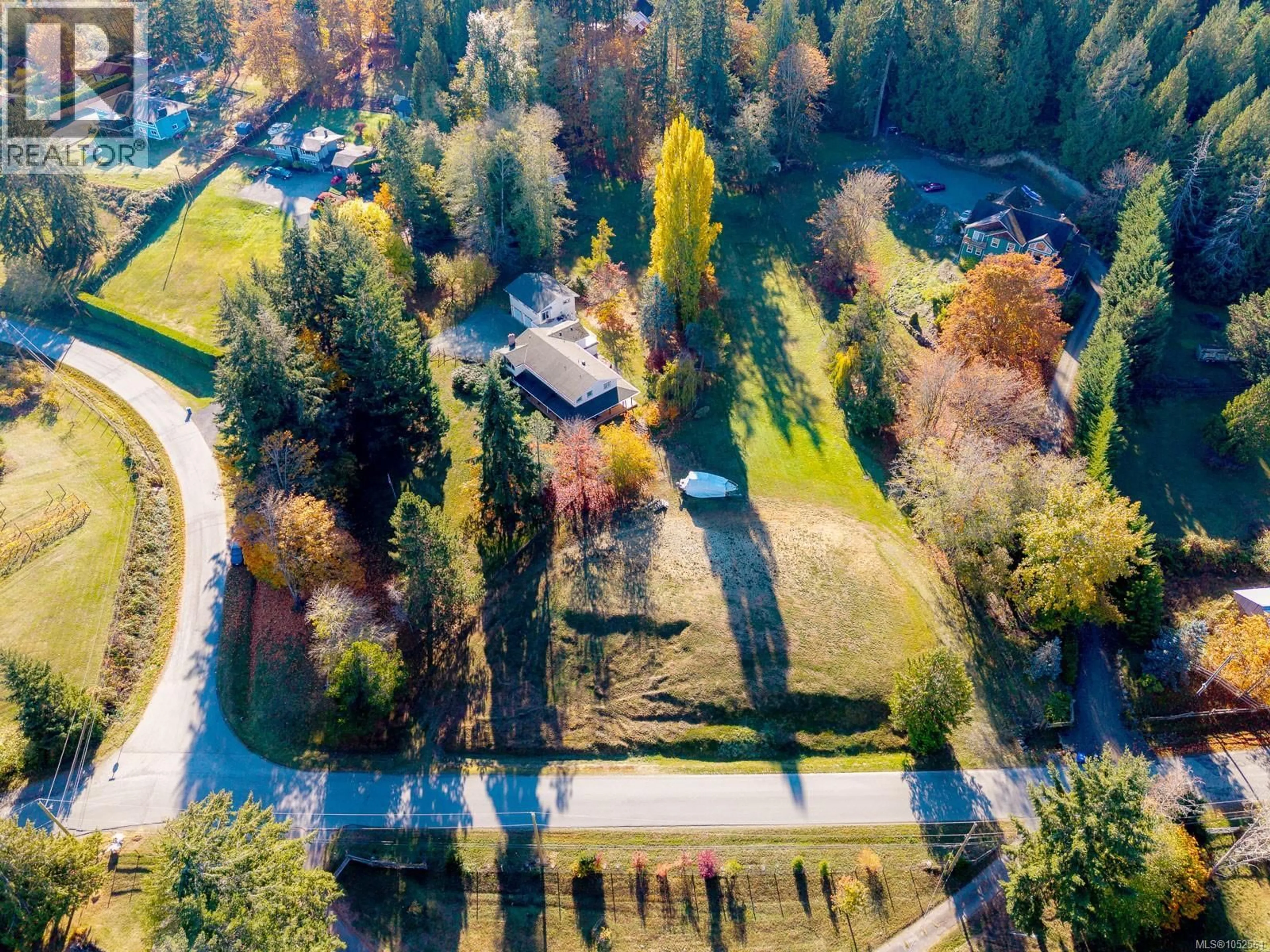 A pic from outside/outdoor area/front of a property/back of a property/a pic from drone, forest/trees view for 1035 BRIARWOOD CRESCENT, Mill Bay British Columbia V8H1A5