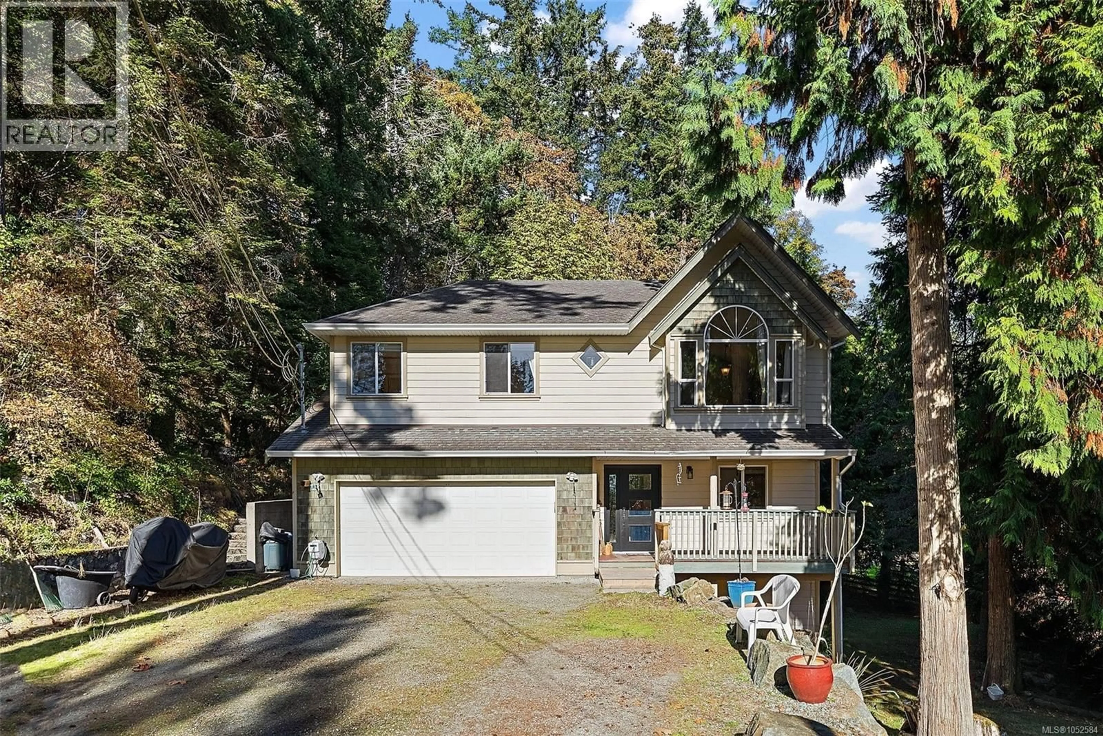 A pic from outside/outdoor area/front of a property/back of a property/a pic from drone, street for 1910 SWARTZ BAY ROAD, North Saanich British Columbia V8L5R2