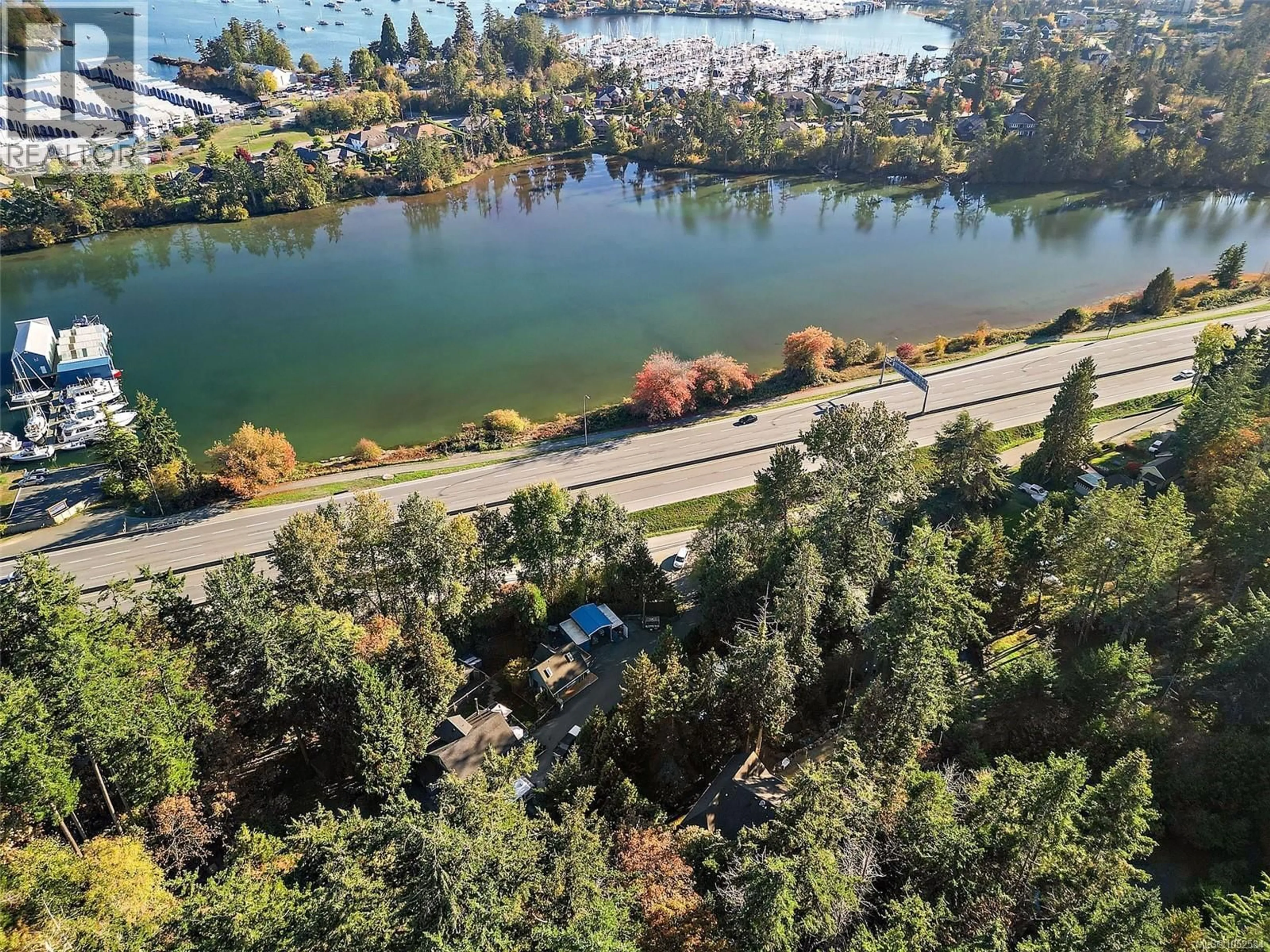 A pic from outside/outdoor area/front of a property/back of a property/a pic from drone, water/lake/river/ocean view for 1910 SWARTZ BAY ROAD, North Saanich British Columbia V8L5R2