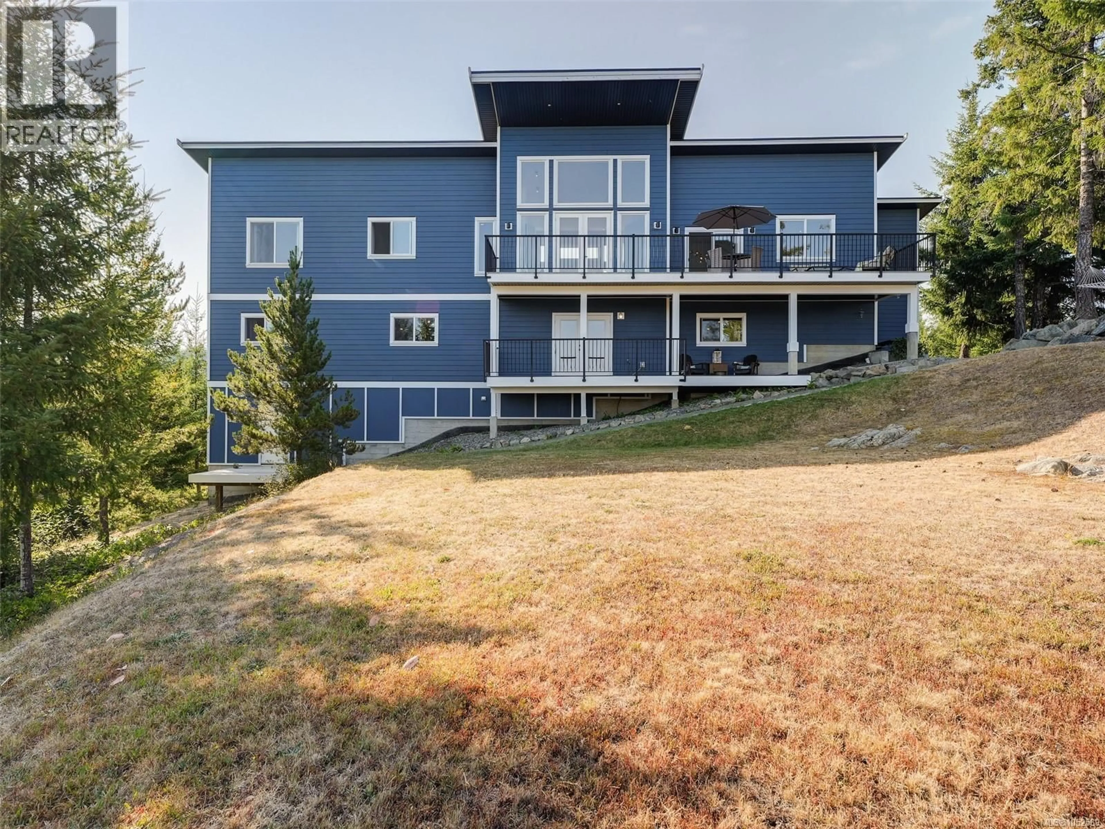 A pic from outside/outdoor area/front of a property/back of a property/a pic from drone, mountain view for 4836 GOLDSTREAM HEIGHTS DRIVE, Shawnigan Lake British Columbia V8H2J1
