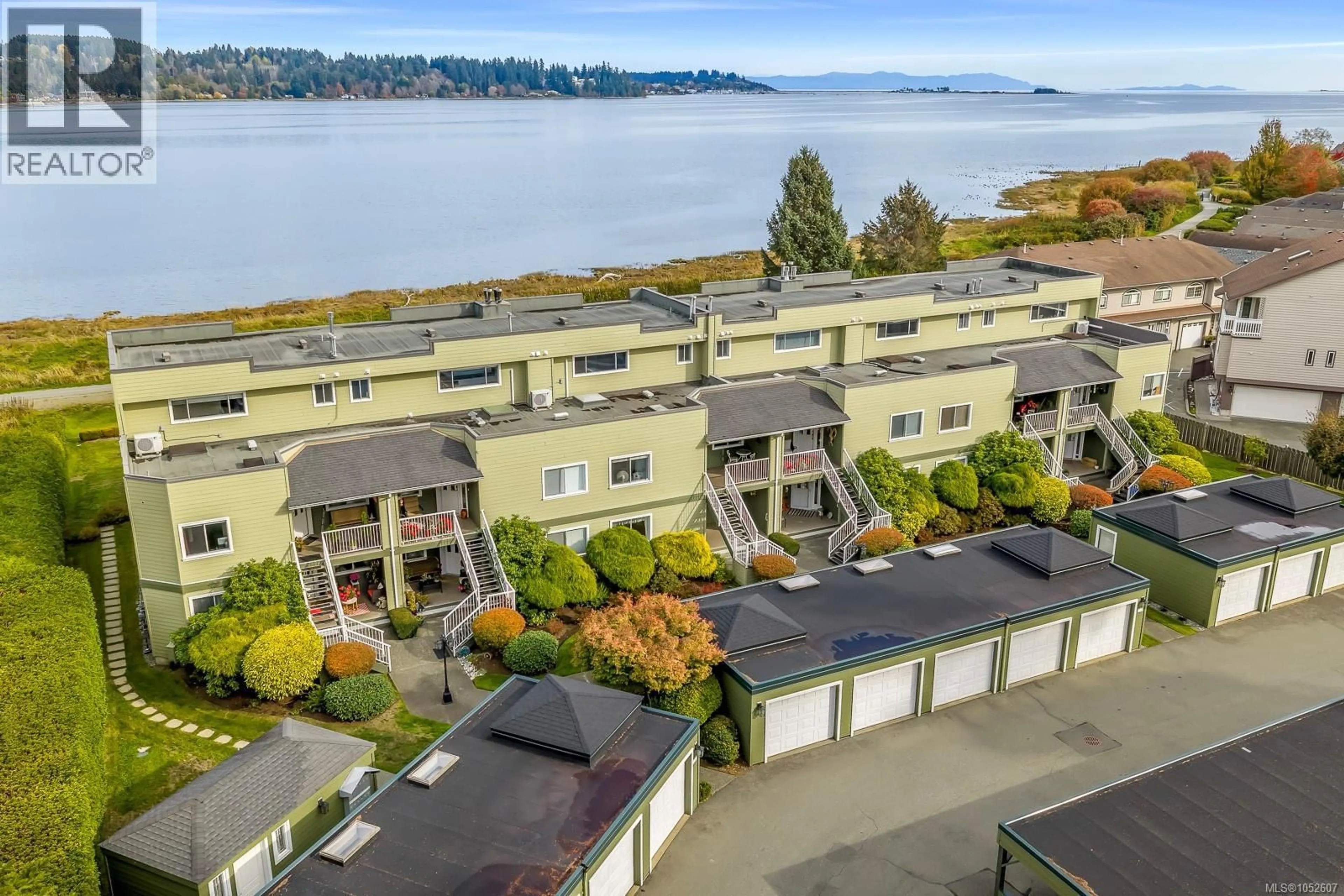 A pic from outside/outdoor area/front of a property/back of a property/a pic from drone, water/lake/river/ocean view for 104 - 2970 CLIFFE AVENUE, Courtenay British Columbia V9N2L7