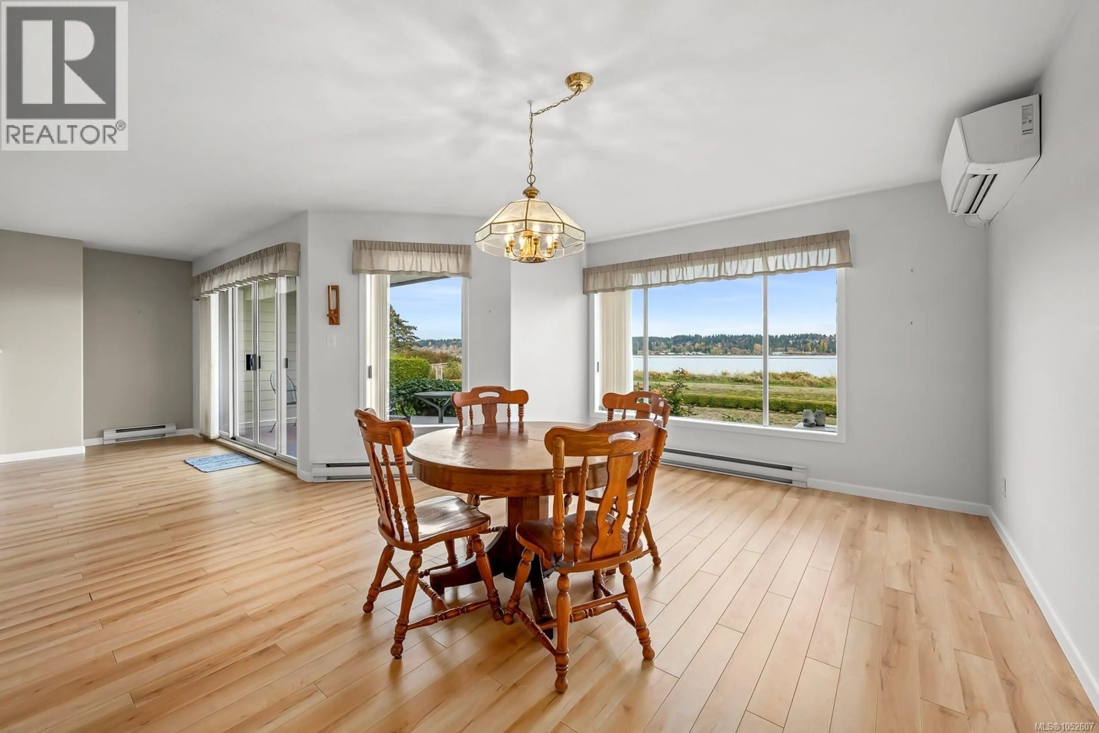 Dining room, wood/laminate floor for 104 - 2970 CLIFFE AVENUE, Courtenay British Columbia V9N2L7