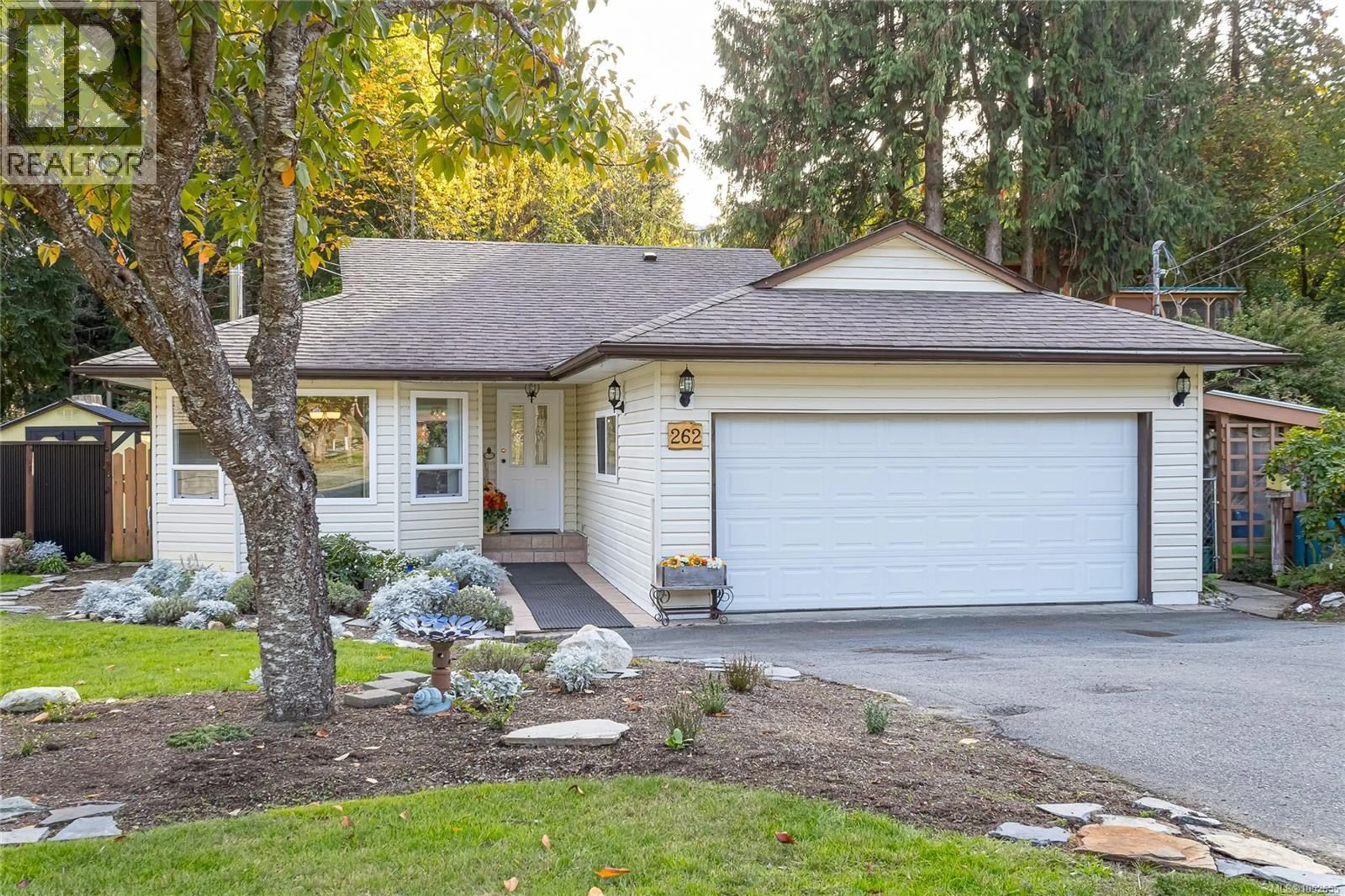 Home with vinyl exterior material, street for 262 RIVER ROAD, Lake Cowichan British Columbia V0R2G0