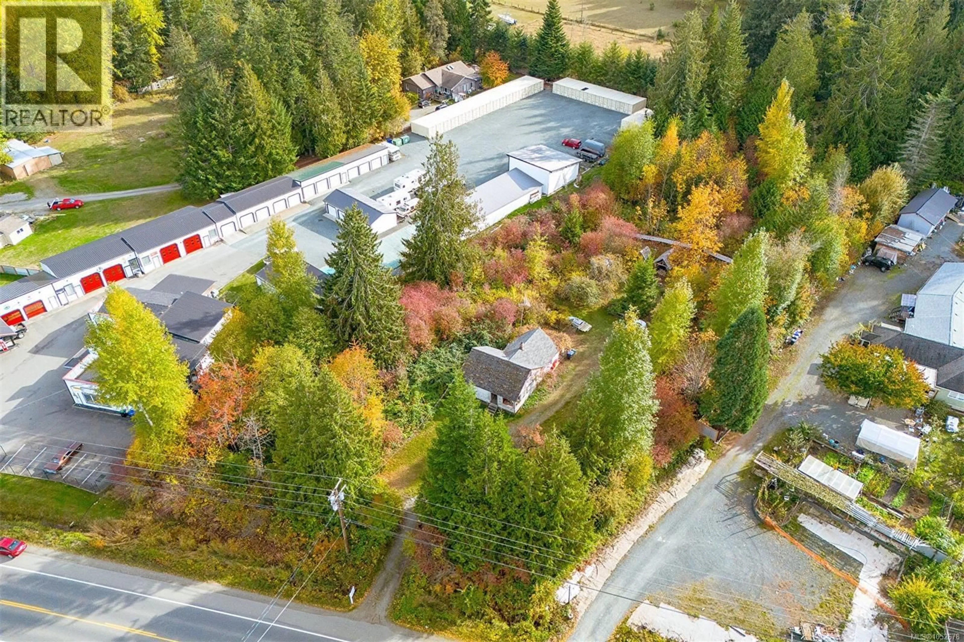 A pic from outside/outdoor area/front of a property/back of a property/a pic from drone, forest/trees view for 2470 ALBERNI HIGHWAY EAST, Coombs British Columbia V0R1M0