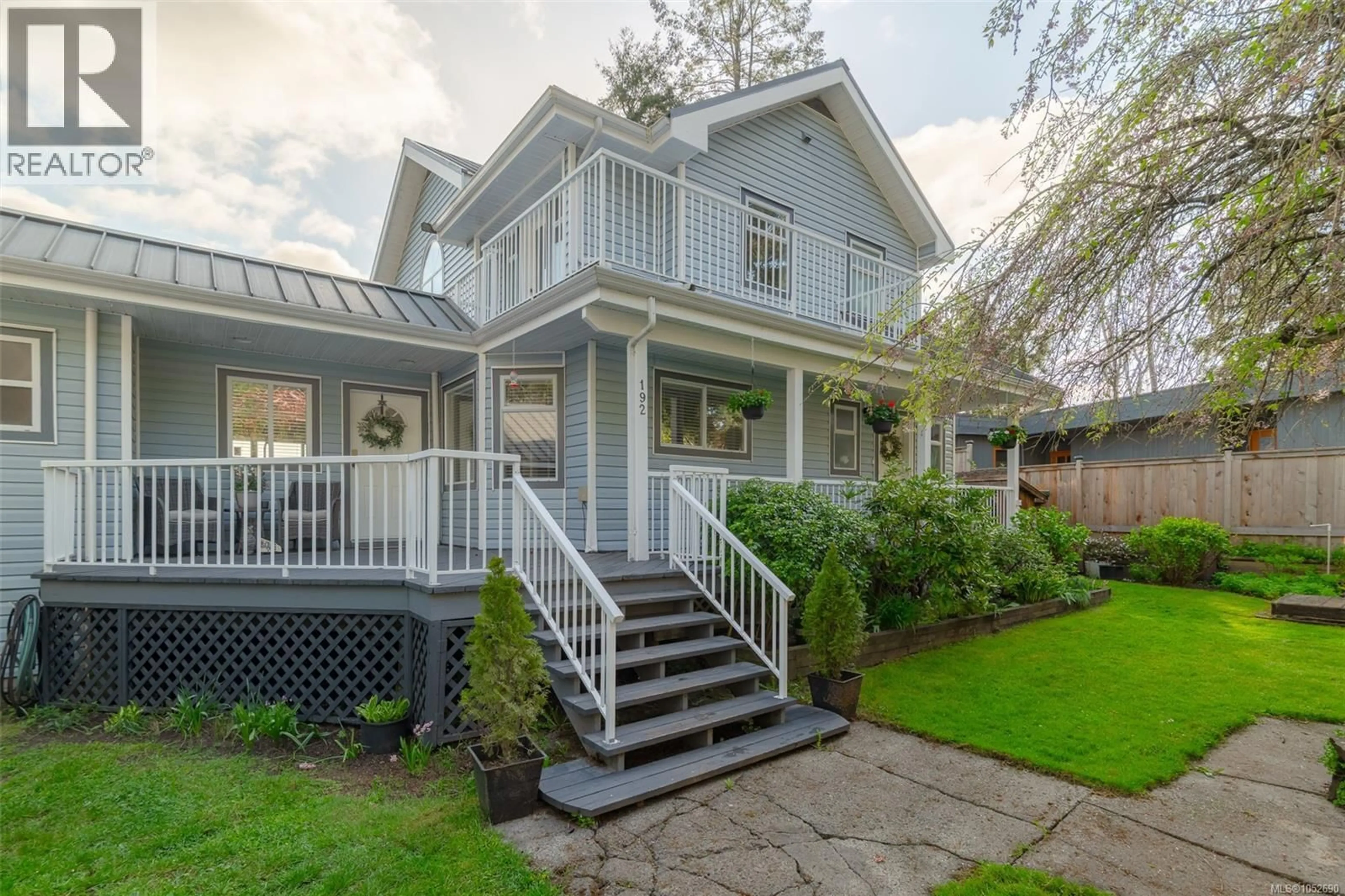 Home with vinyl exterior material, street for 192 CAPTAIN MORGANS BOULEVARD, Protection Island British Columbia V9R6R1