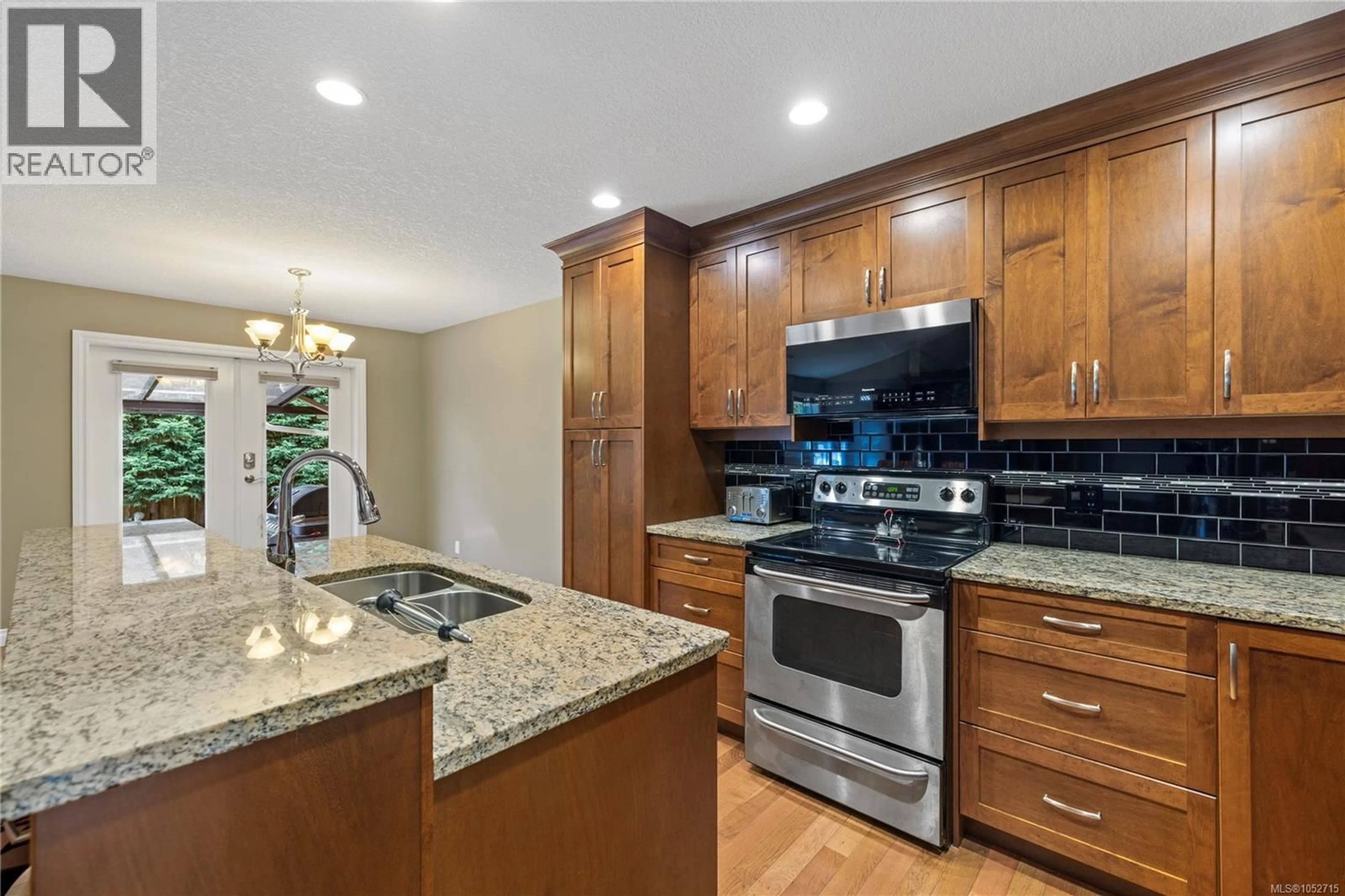 Open concept kitchen, ceramic/tile floor for 315 CRABAPPLE CRESCENT, Parksville British Columbia V9P2J1