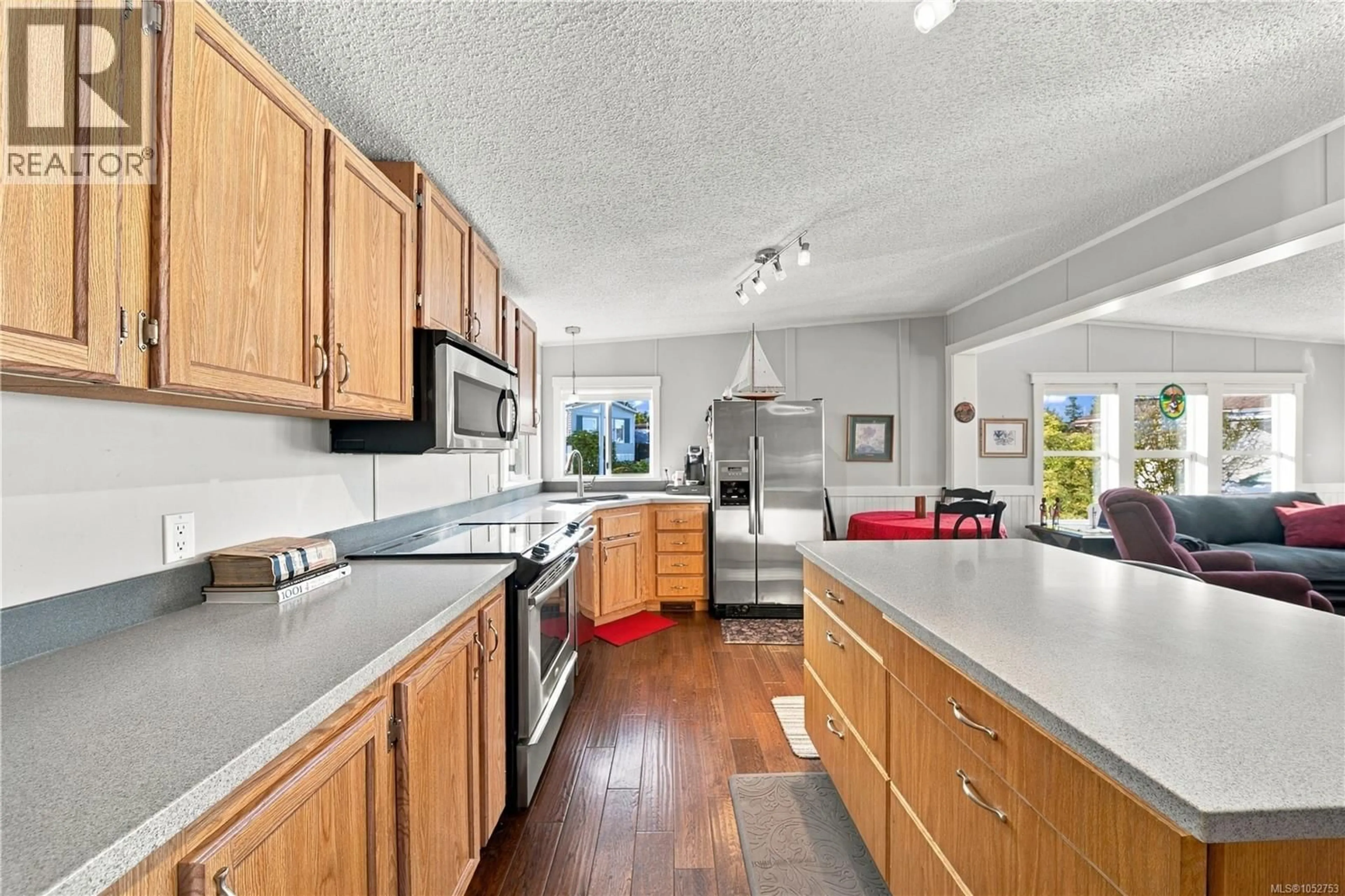Open concept kitchen, ceramic/tile floor for 7 - 2301 ARBOT ROAD, Nanaimo British Columbia V9R6S5