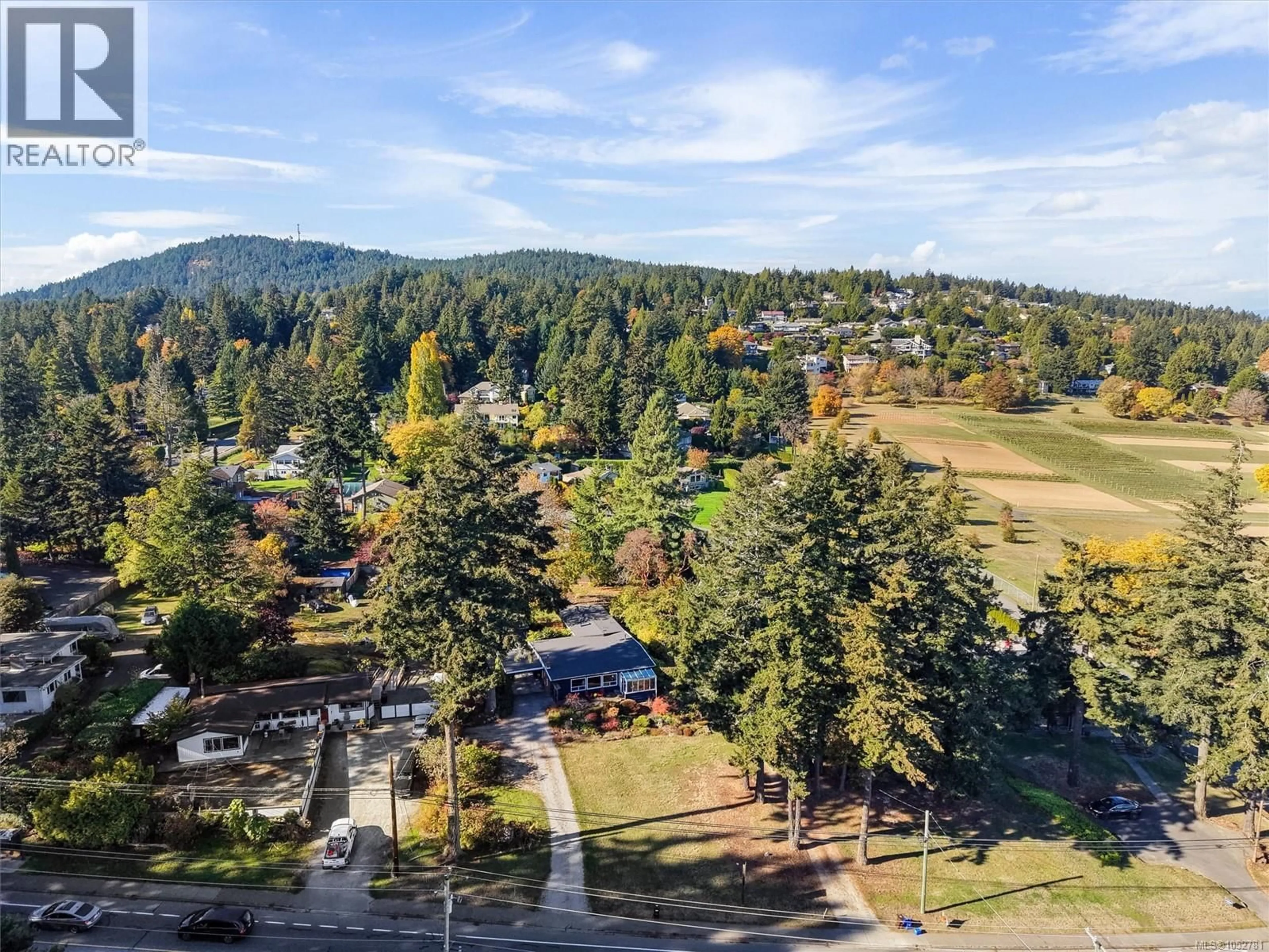 A pic from outside/outdoor area/front of a property/back of a property/a pic from drone, forest/trees view for 8698 EAST SAANICH ROAD, North Saanich British Columbia V8L1H2