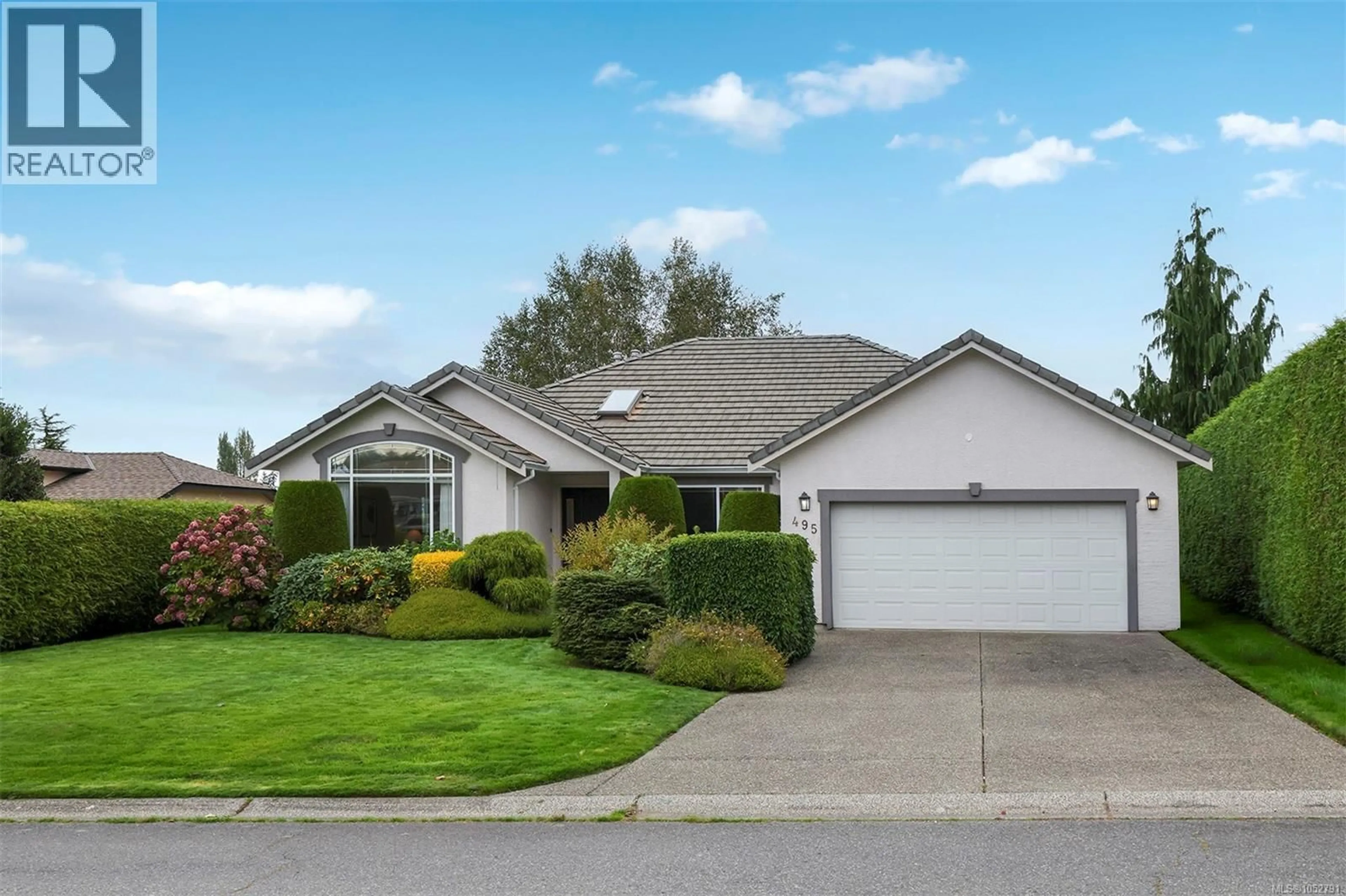 Home with vinyl exterior material, street for 495 TROON CLOSE, Qualicum Beach British Columbia V9K1C9