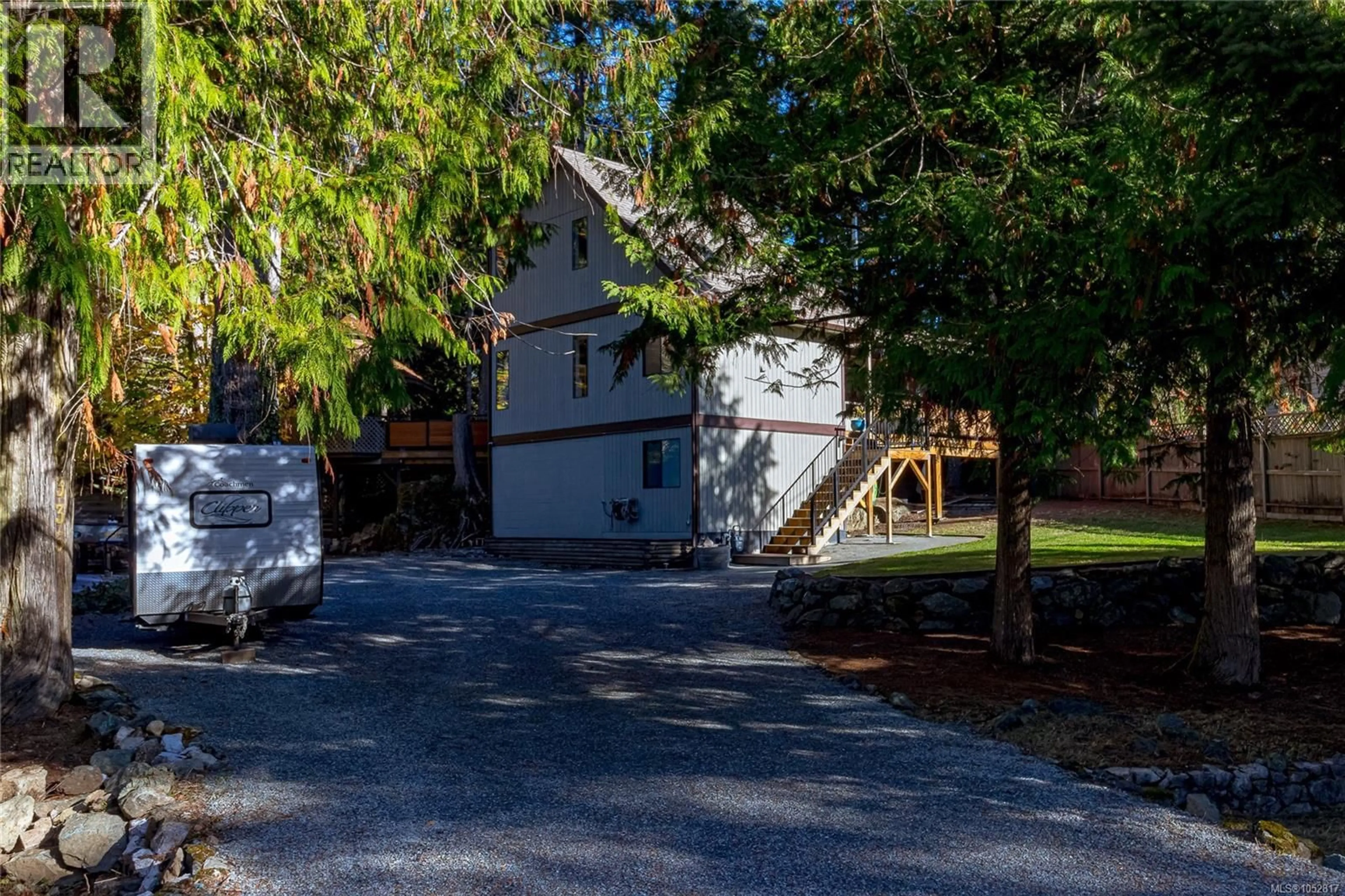 A pic from outside/outdoor area/front of a property/back of a property/a pic from drone, street for 2335 RAVENHILL ROAD, Shawnigan Lake British Columbia V0R2W1