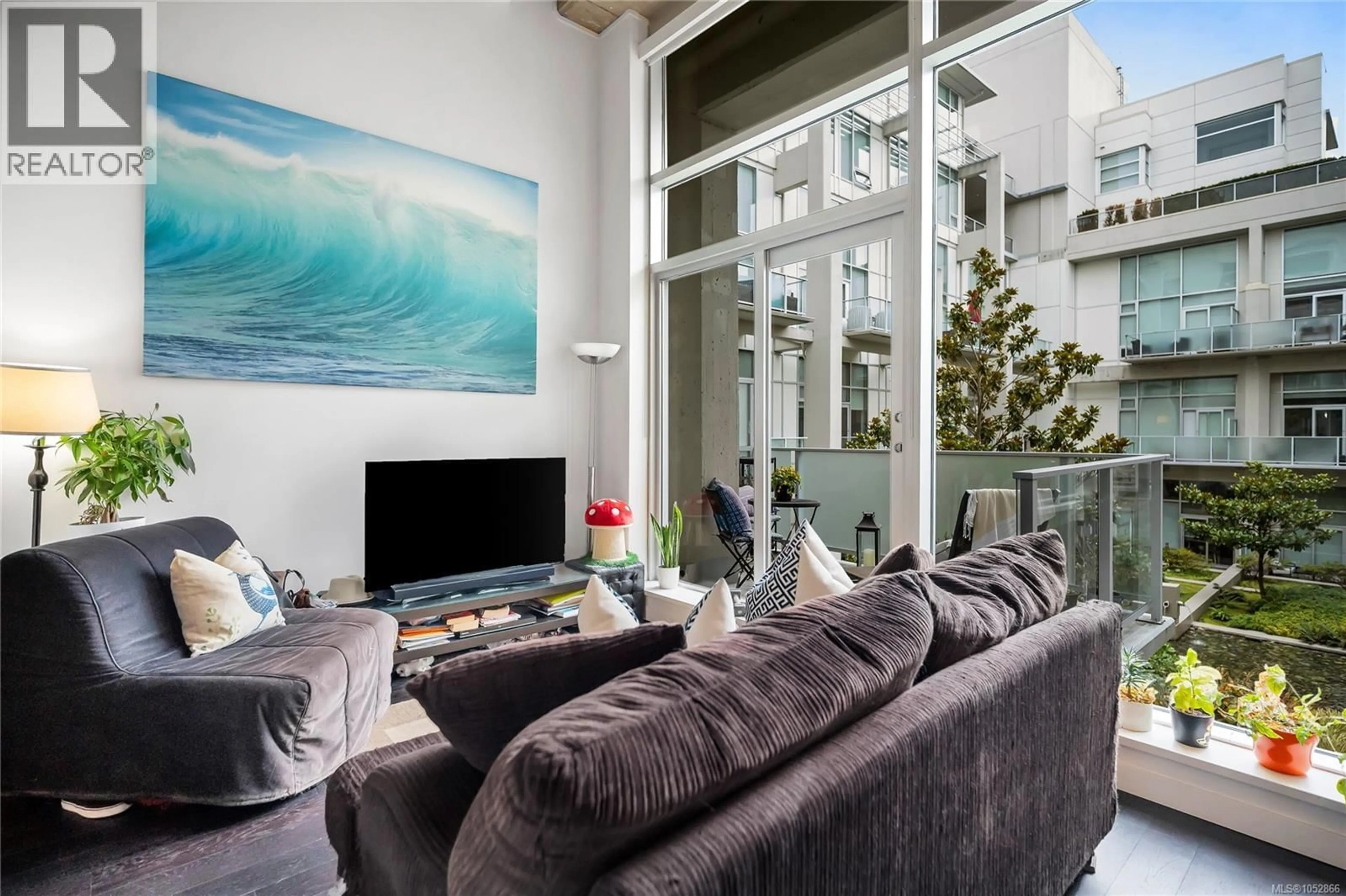 Living room with furniture, unknown for 327 - 770 FISGARD STREET, Victoria British Columbia V8W3M9