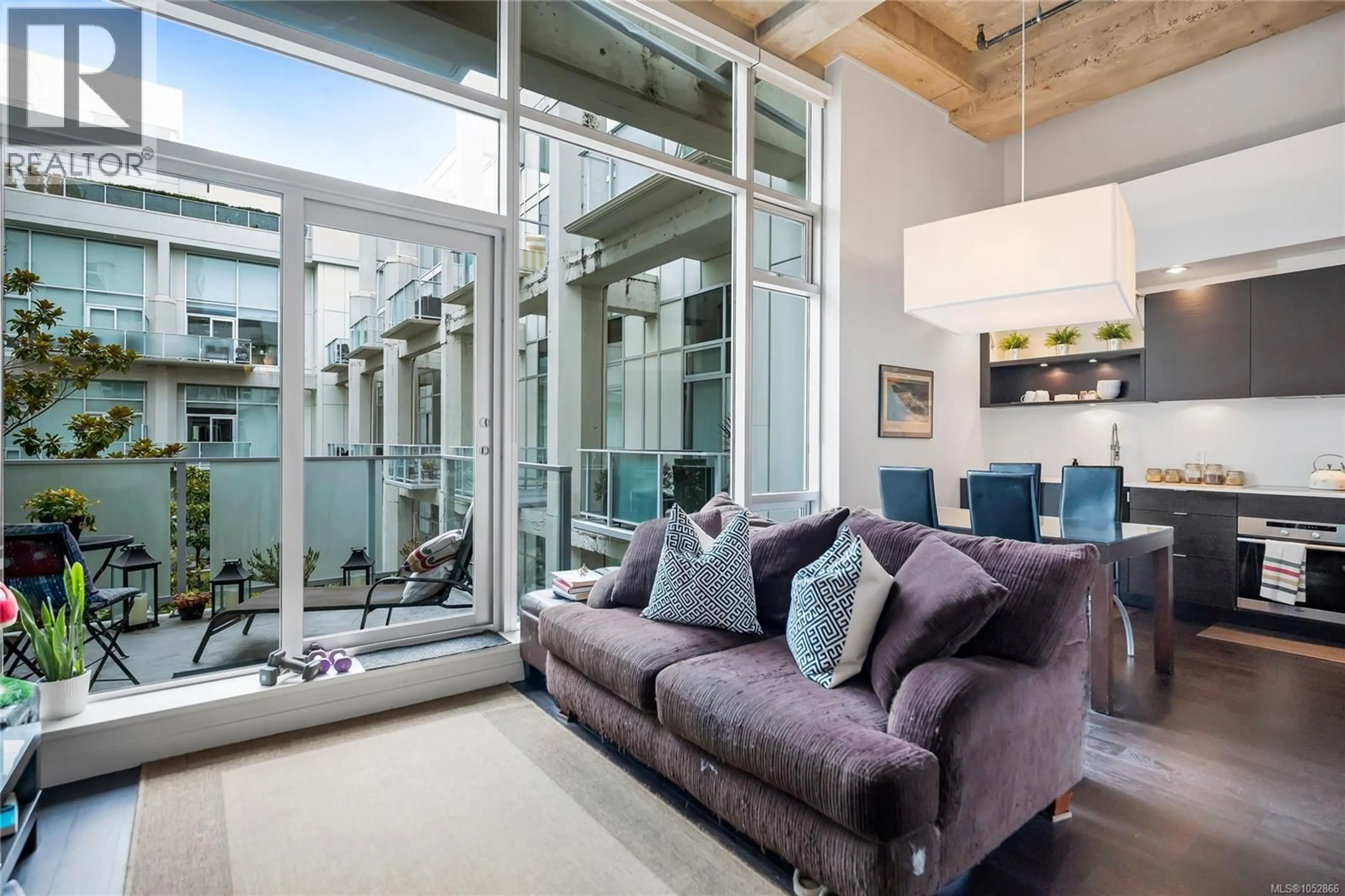 Living room with furniture, cement floor for 327 - 770 FISGARD STREET, Victoria British Columbia V8W3M9
