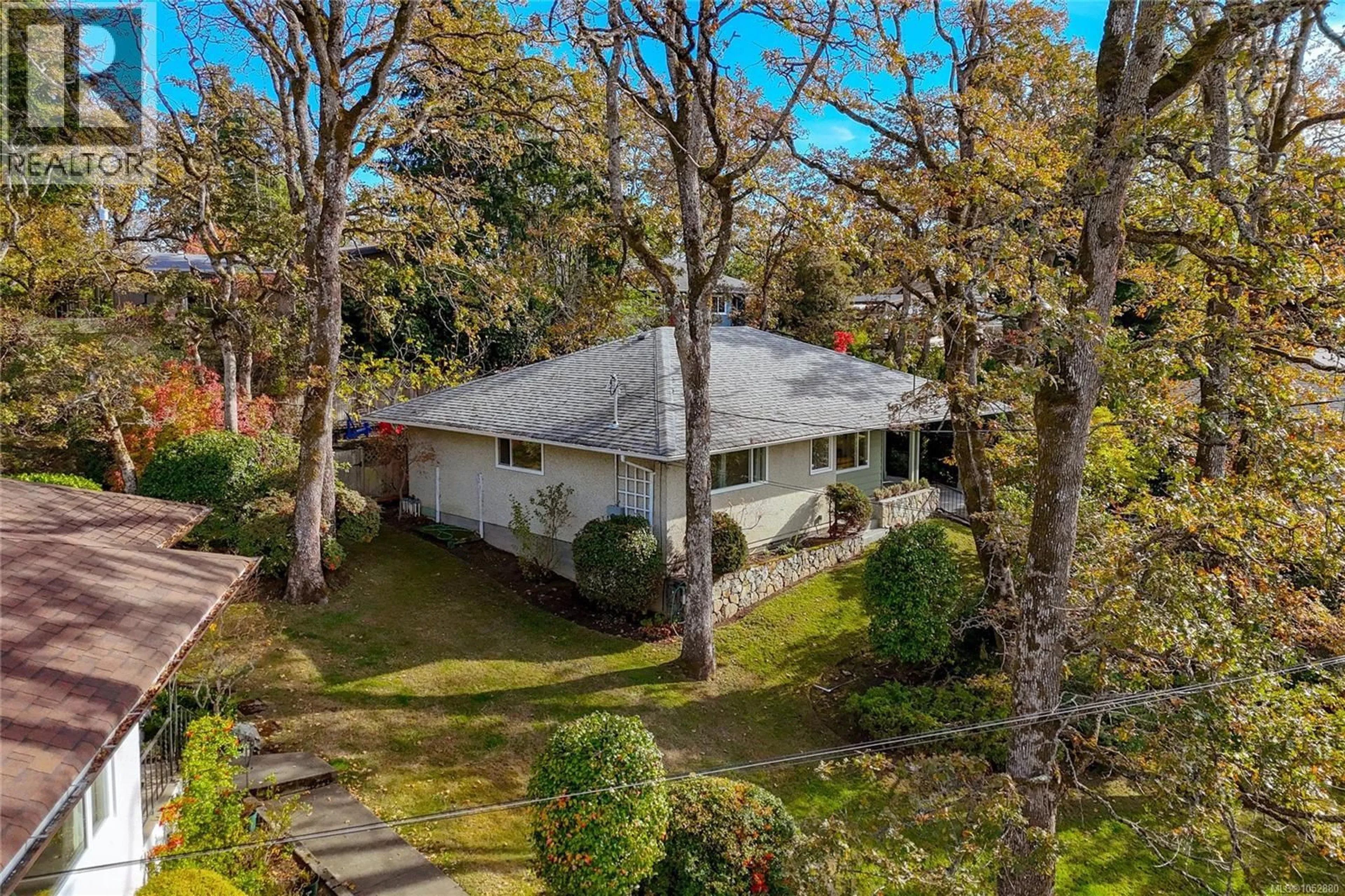 A pic from outside/outdoor area/front of a property/back of a property/a pic from drone, street for 1287 FILMER ROAD, Saanich British Columbia V8P1W5