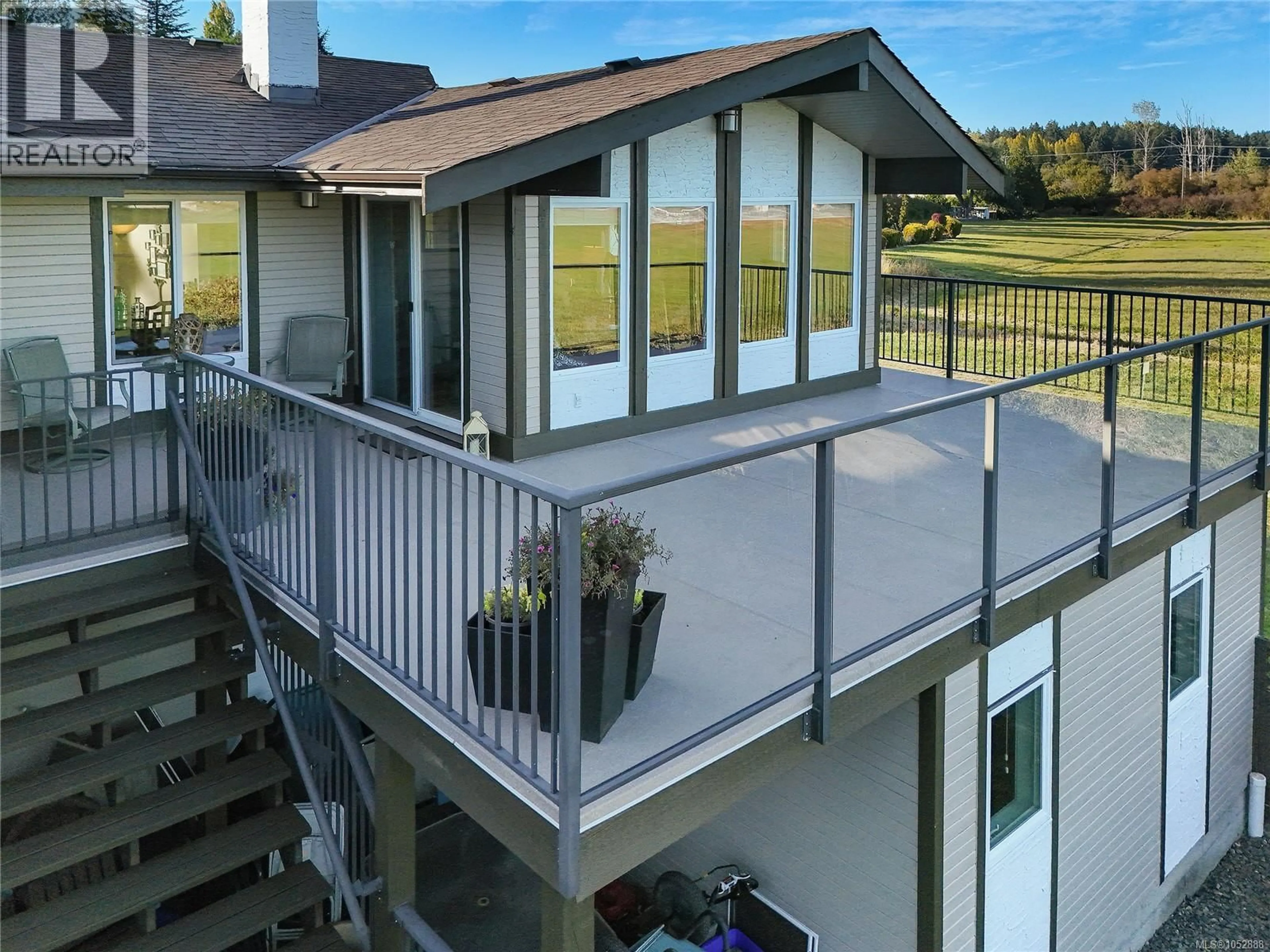 A pic from outside/outdoor area/front of a property/back of a property/a pic from drone, unknown for 7043 BICKSTAN PLACE, Central Saanich British Columbia V8M1G8