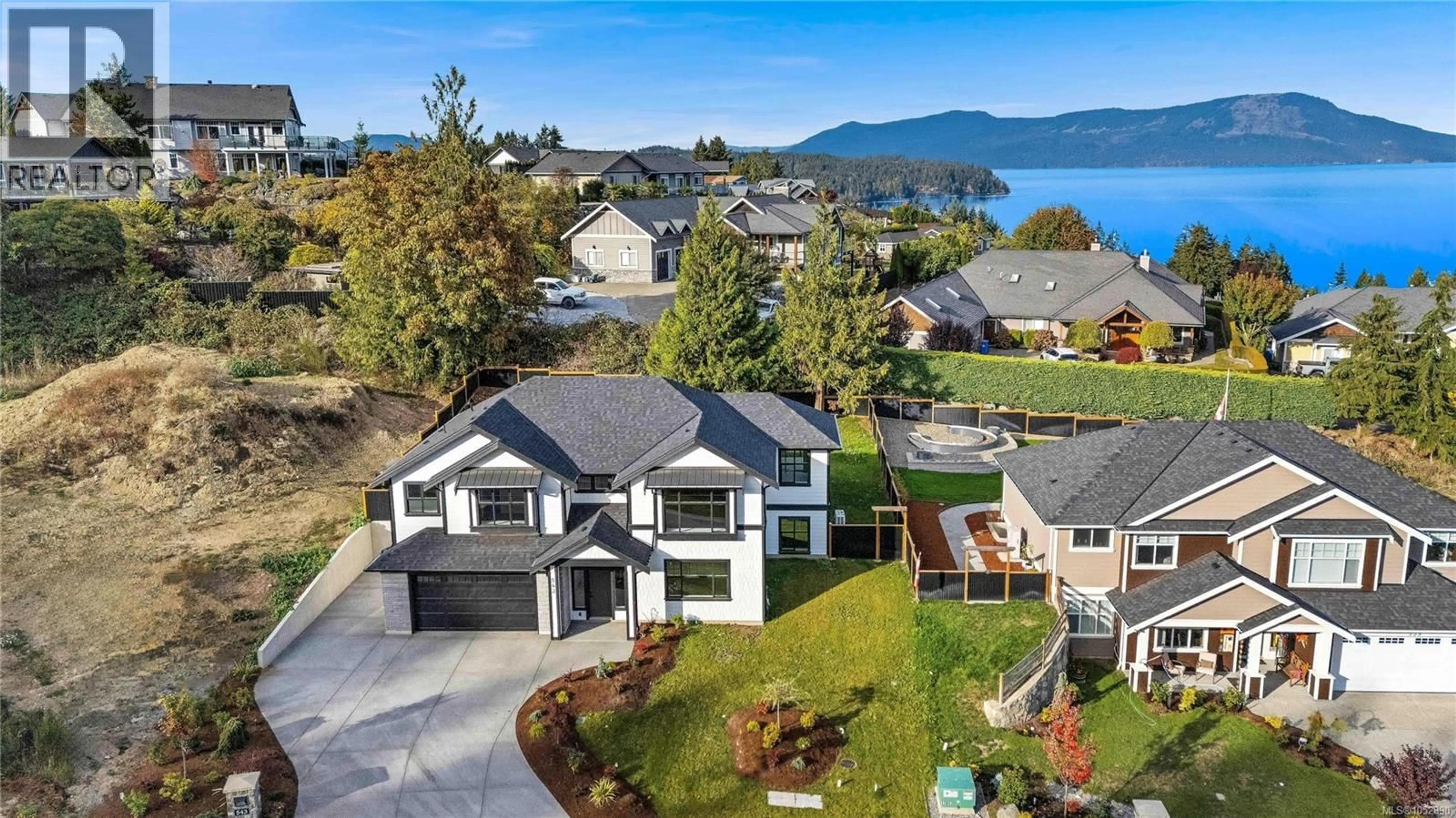 A pic from outside/outdoor area/front of a property/back of a property/a pic from drone, water/lake/river/ocean view for 543 BICKFORD WAY, Mill Bay British Columbia V8H1H7