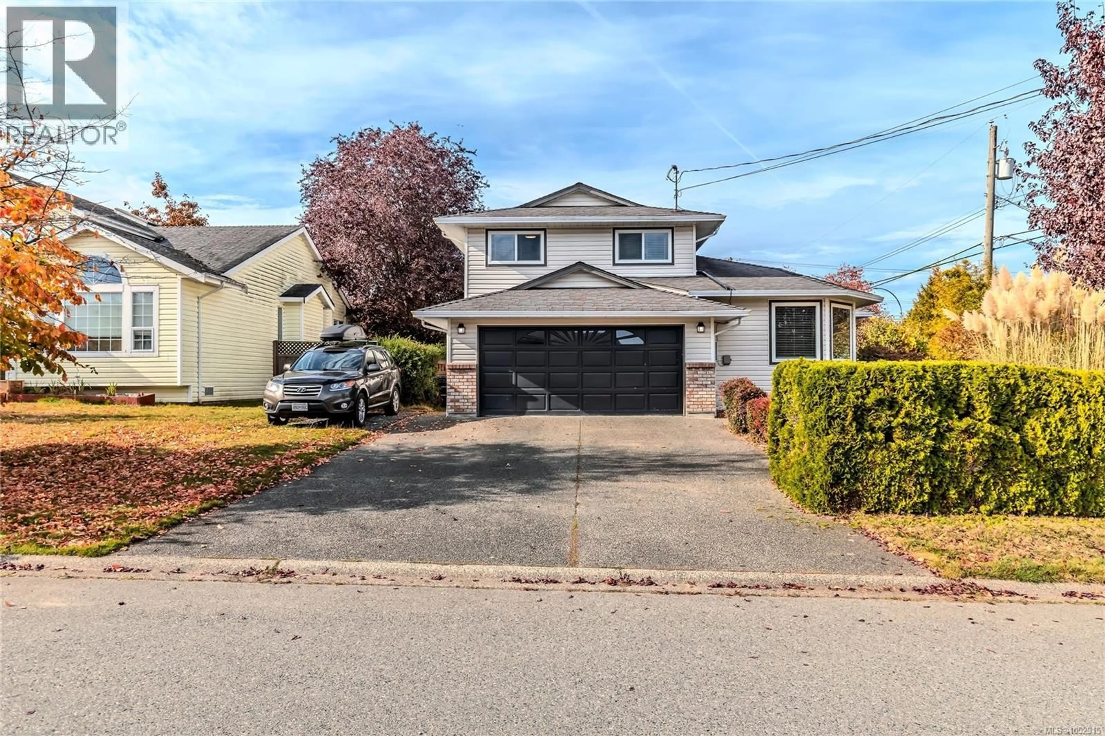 A pic from outside/outdoor area/front of a property/back of a property/a pic from drone, street for 5977 BROADWAY ROAD, Nanaimo British Columbia V9V1C9