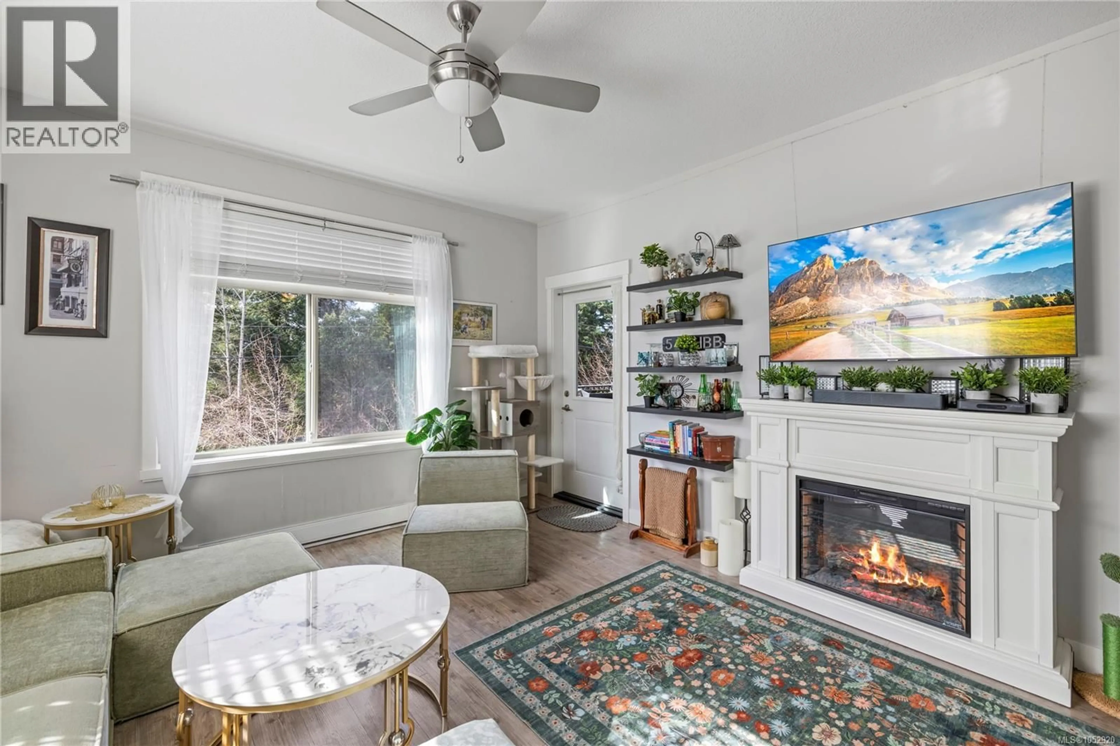 Living room with furniture, ceramic/tile floor for 210 - 1900 TULSA ROAD, Nanaimo British Columbia V9S0C2