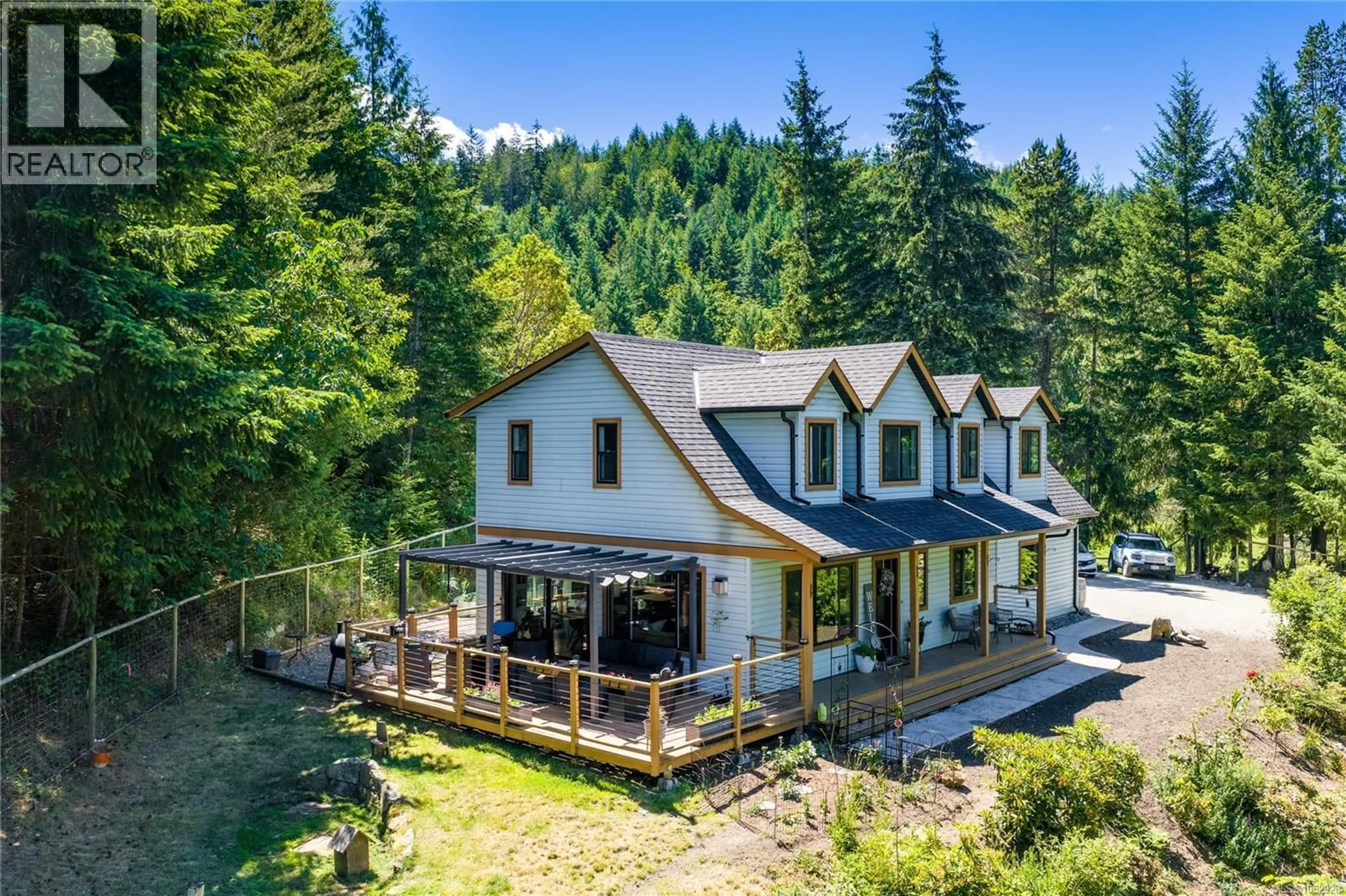 A pic from outside/outdoor area/front of a property/back of a property/a pic from drone, unknown for 1691 MEADOWOOD WAY, Qualicum Beach British Columbia V9K2S3