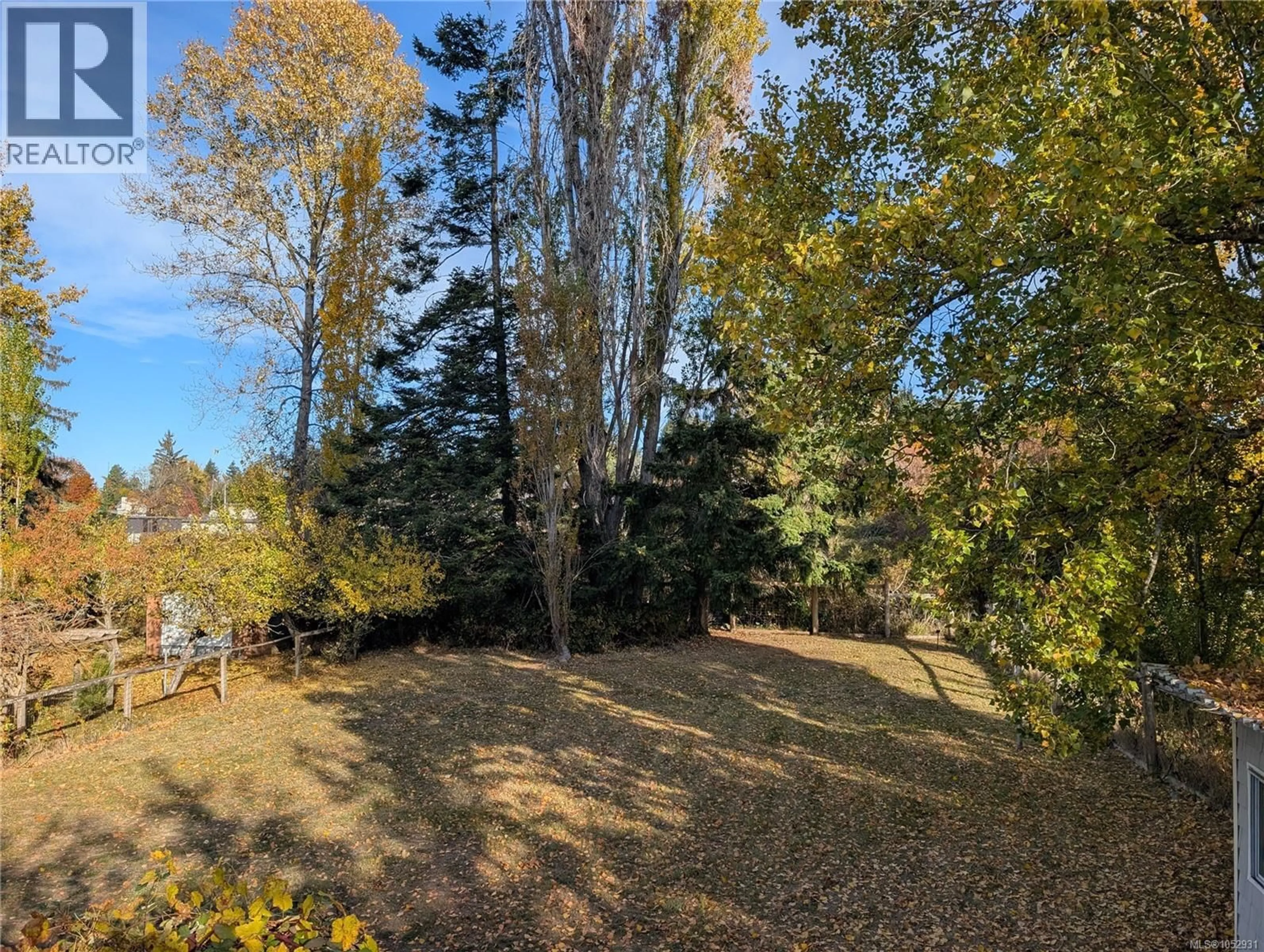 A pic from outside/outdoor area/front of a property/back of a property/a pic from drone, forest/trees view for 1440 DOGWOOD AVENUE, Comox British Columbia V9M2Z5