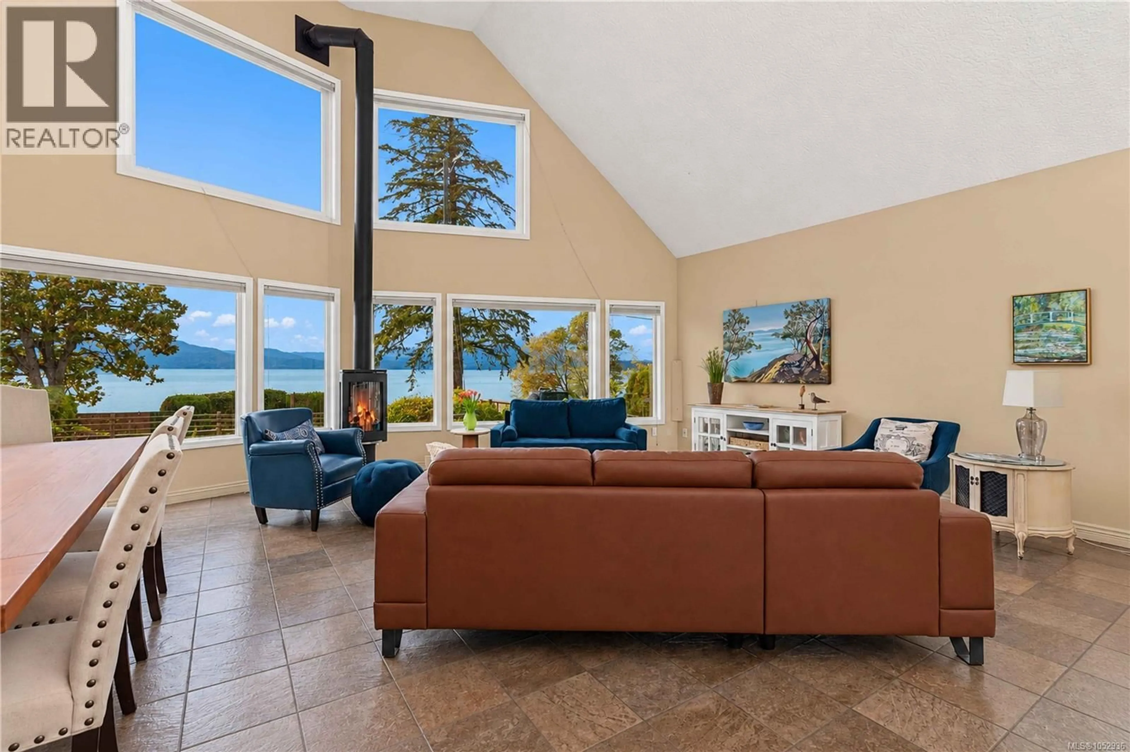Living room with furniture, ceramic/tile floor for 10189 WEST SAANICH ROAD, North Saanich British Columbia V8L5T6