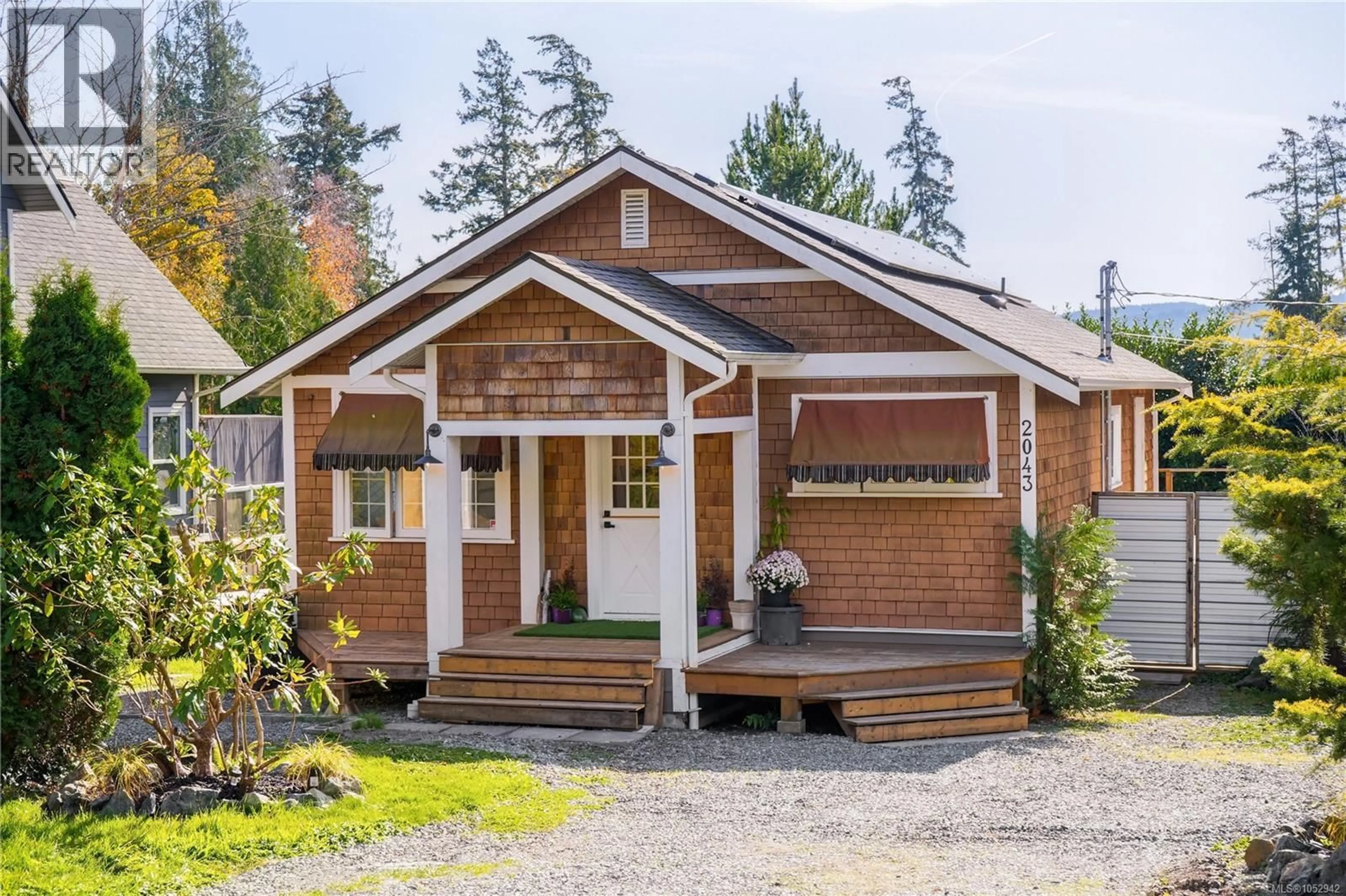 Home with vinyl exterior material, street for 2043 SASEENOS ROAD, Sooke British Columbia V9Z0C4