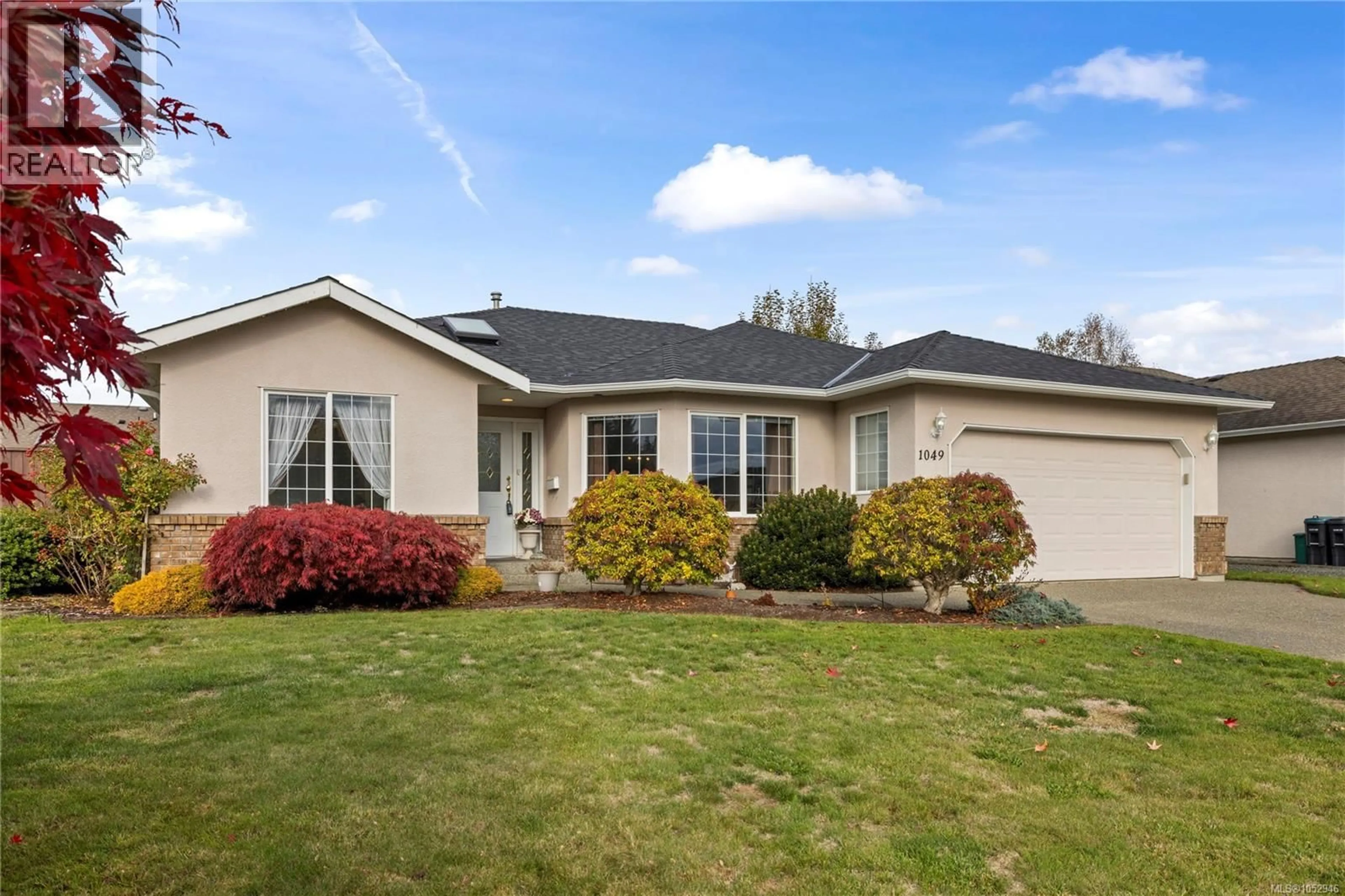 Home with vinyl exterior material, street for 1049 SUNRISE DRIVE, Qualicum Beach British Columbia V9K2K6