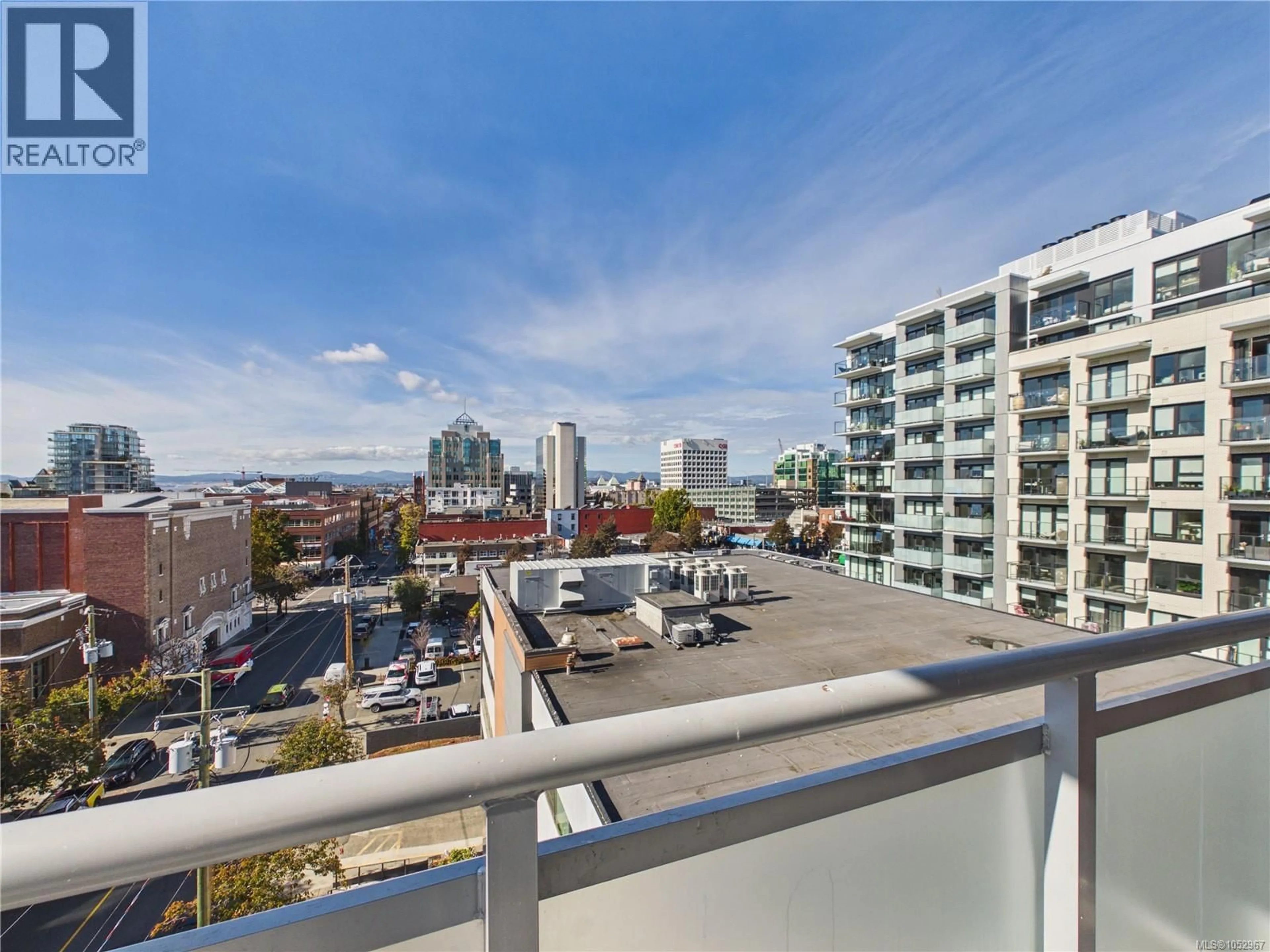 Balcony in the apartment, city buildings view from balcony for 709 - 838 BROUGHTON STREET, Victoria British Columbia V8W1E4