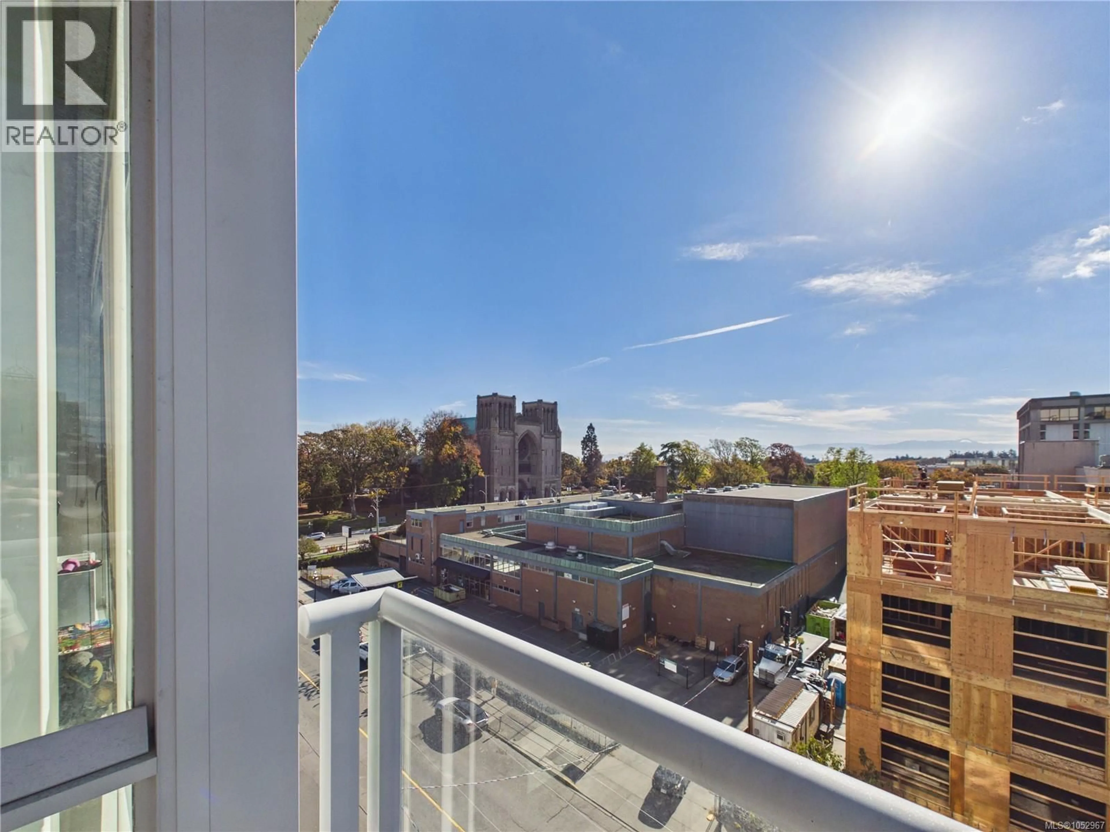 Balcony in the apartment, city buildings view from balcony for 709 - 838 BROUGHTON STREET, Victoria British Columbia V8W1E4