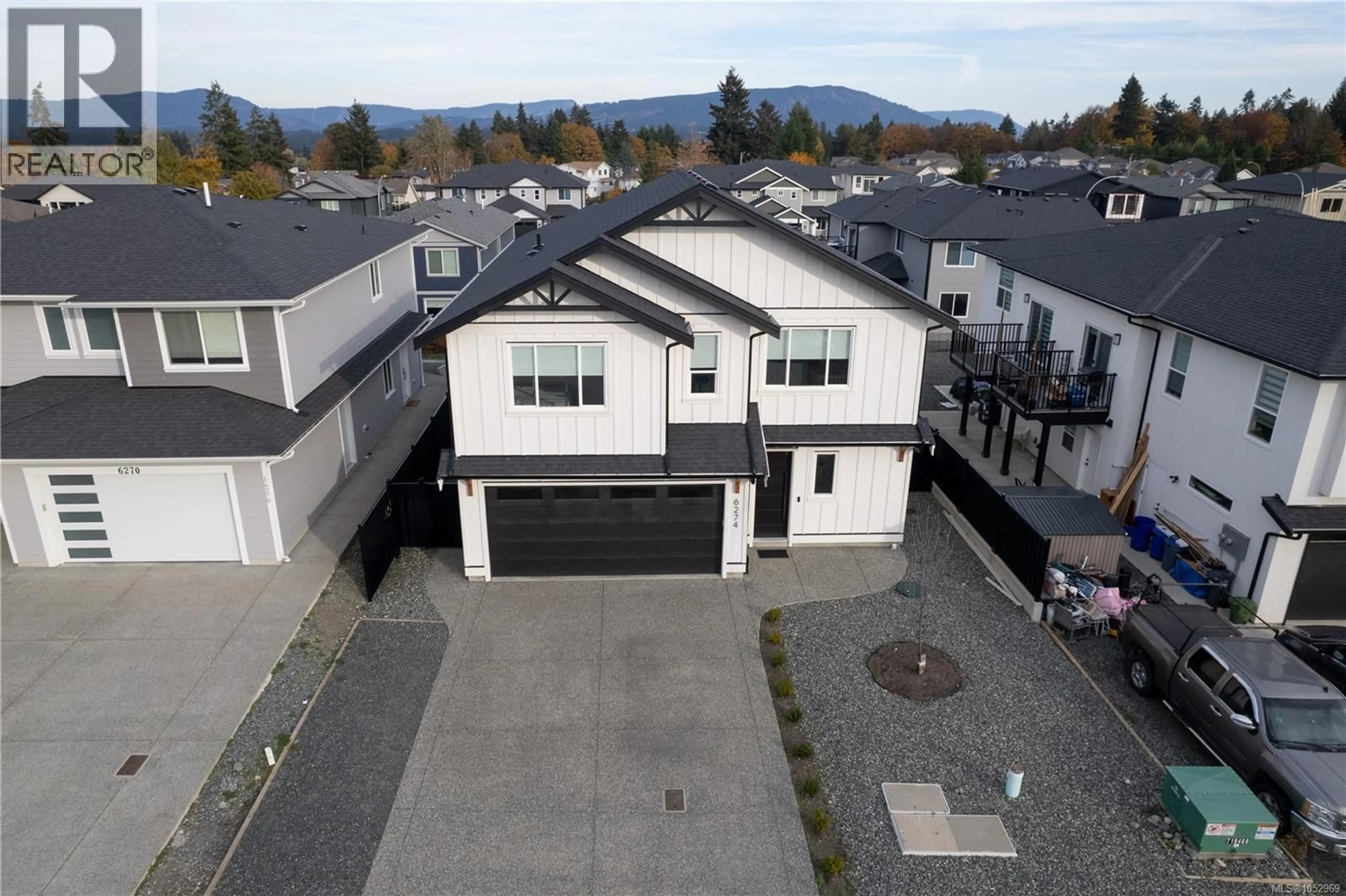 A pic from outside/outdoor area/front of a property/back of a property/a pic from drone, mountain view for 6274 OLD MILL ROAD, Duncan British Columbia V9L0G7