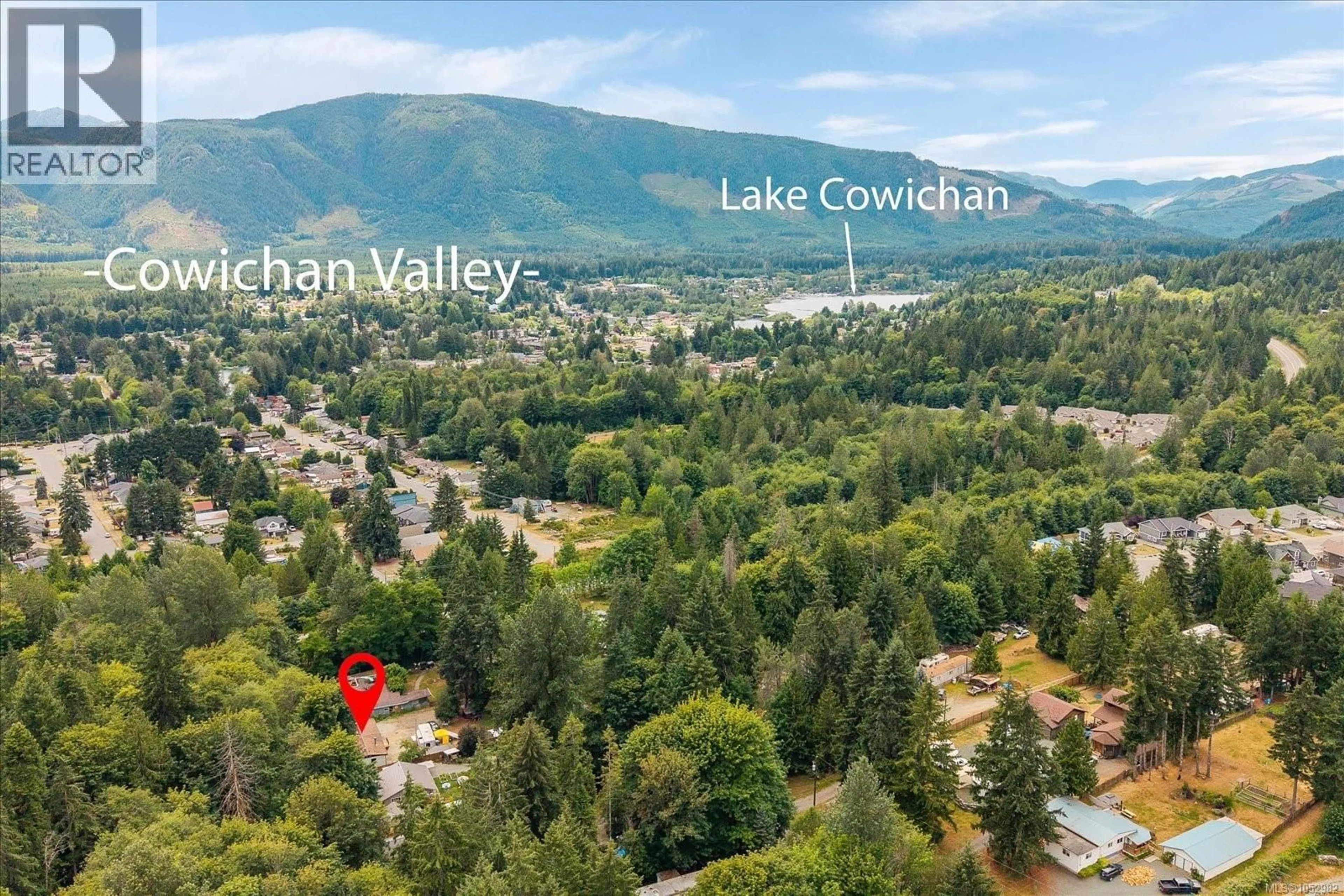 A pic from outside/outdoor area/front of a property/back of a property/a pic from drone, water/lake/river/ocean view for 7353 NEVA ROAD, Lake Cowichan British Columbia V0R2G0