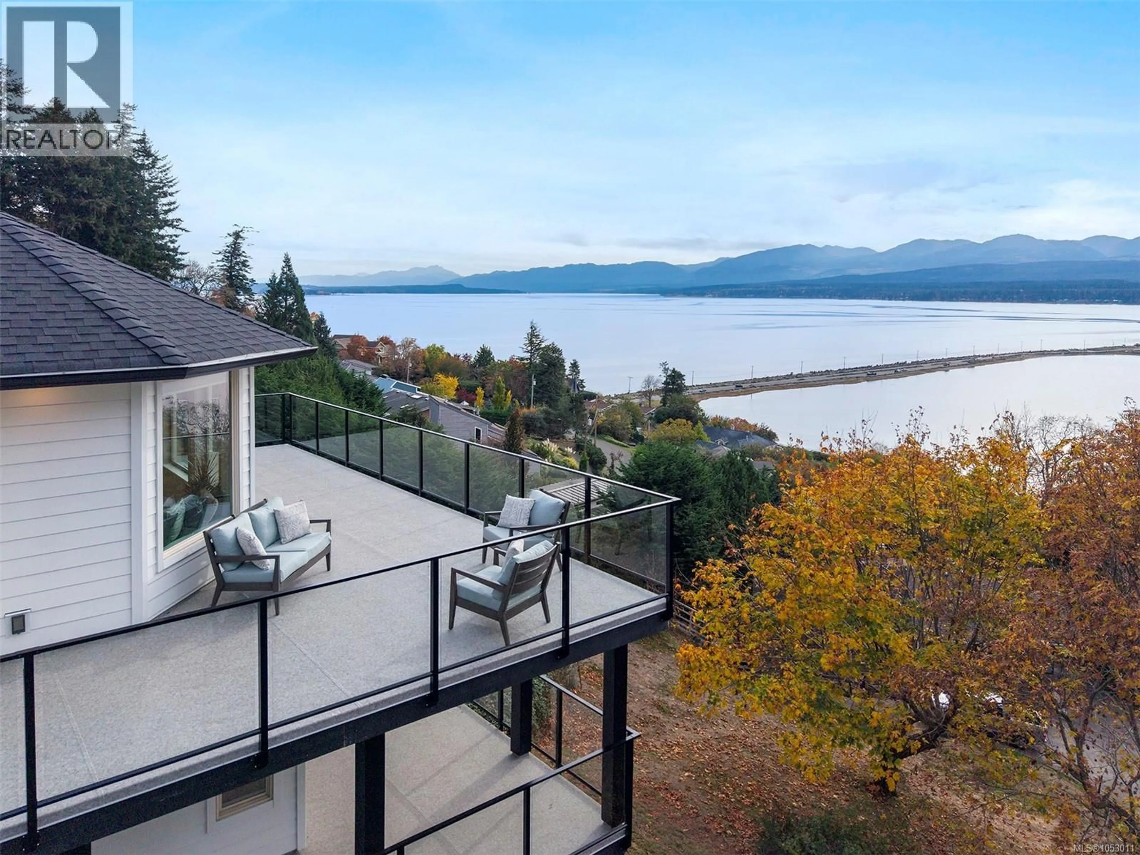 A pic from outside/outdoor area/front of a property/back of a property/a pic from drone, water/lake/river/ocean view for 1161 MOORE ROAD, Comox British Columbia V9M3X1