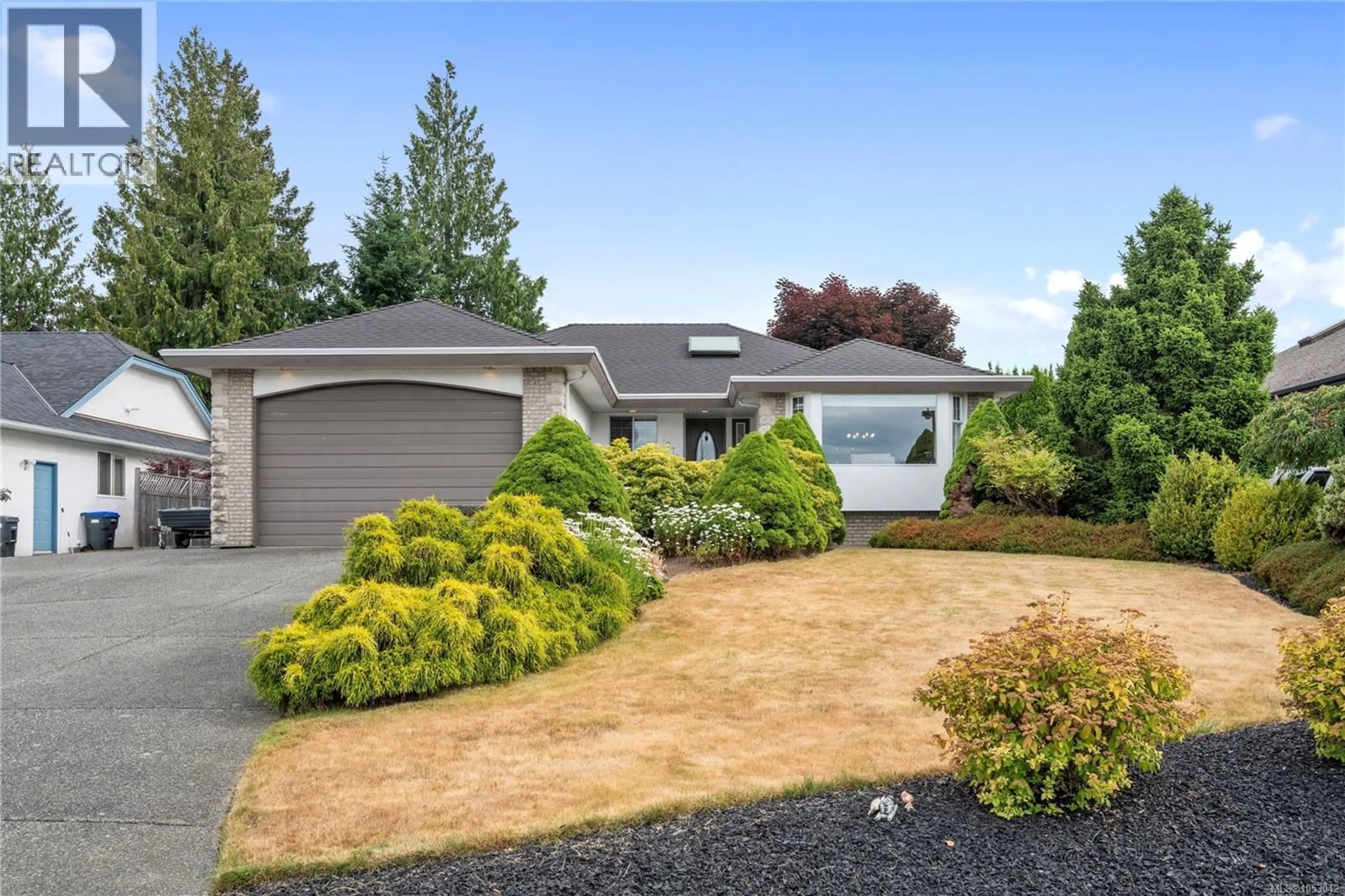 Home with vinyl exterior material, street for 1072 ROBERTON BOULEVARD, Parksville British Columbia V9P2N9