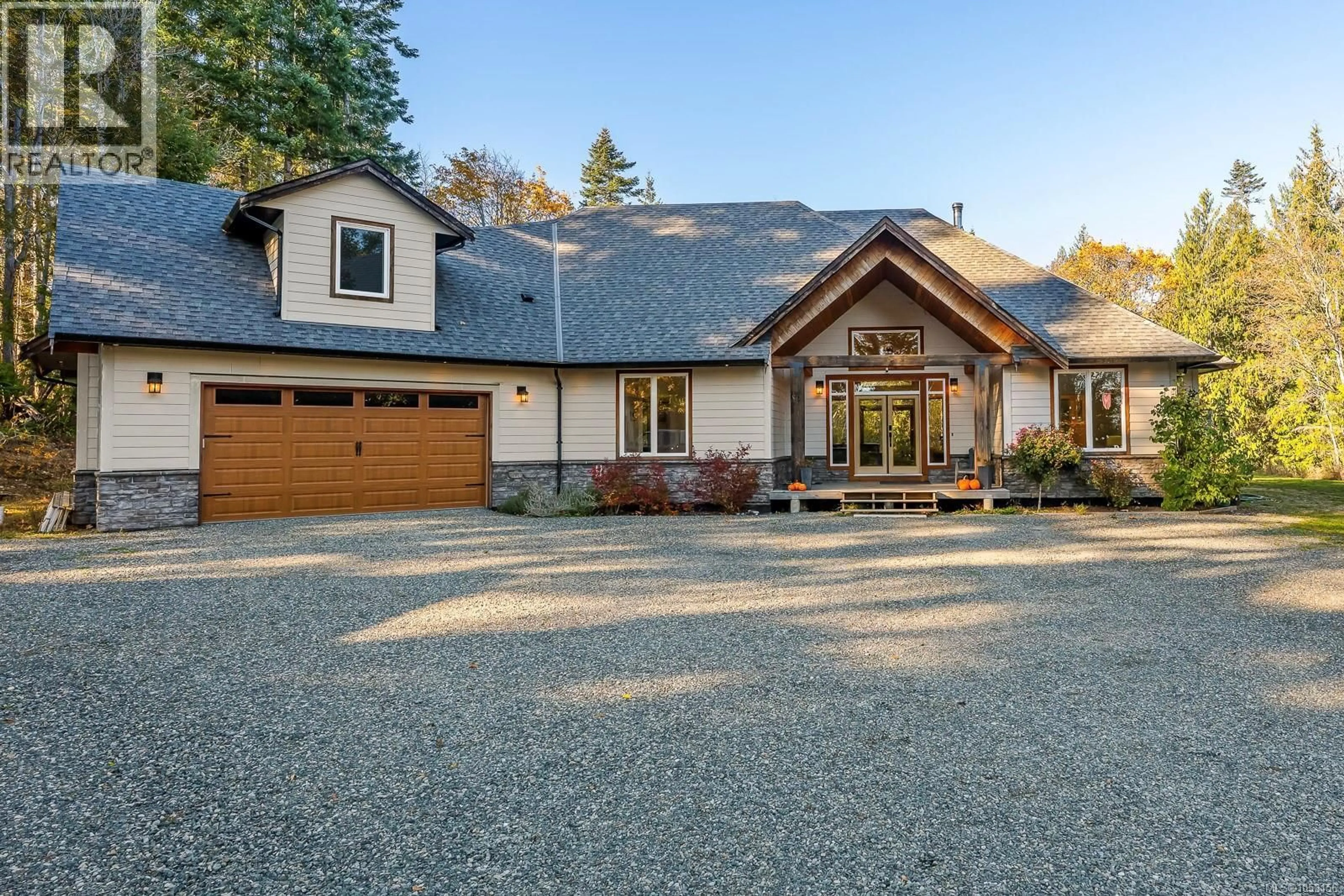 Home with brick exterior material, street for 5861 GARVIN ROAD, Union Bay British Columbia V0R3B0