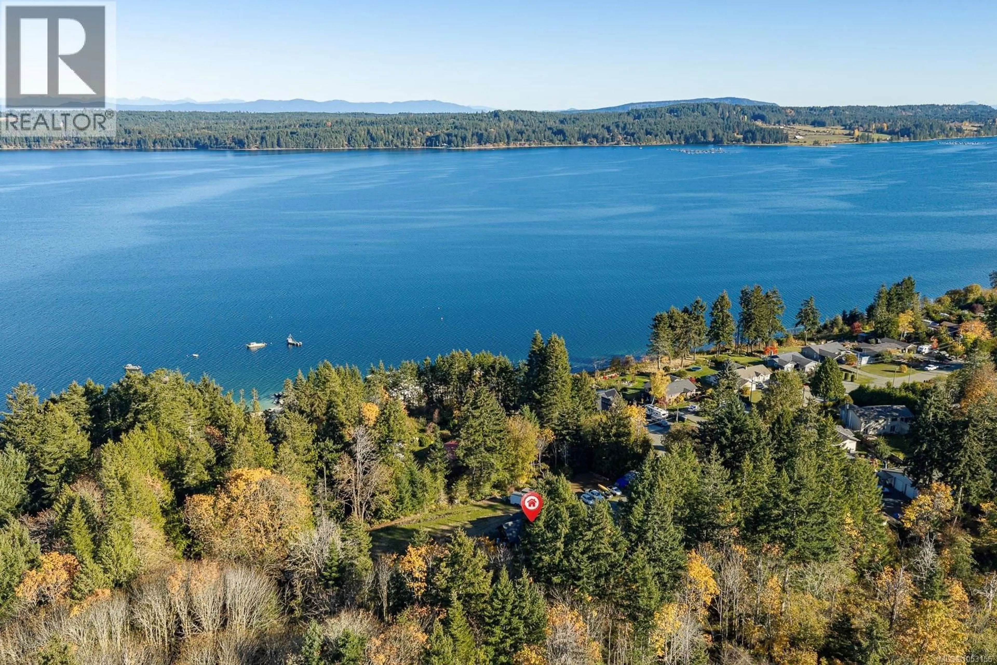 A pic from outside/outdoor area/front of a property/back of a property/a pic from drone, water/lake/river/ocean view for 5861 GARVIN ROAD, Union Bay British Columbia V0R3B0