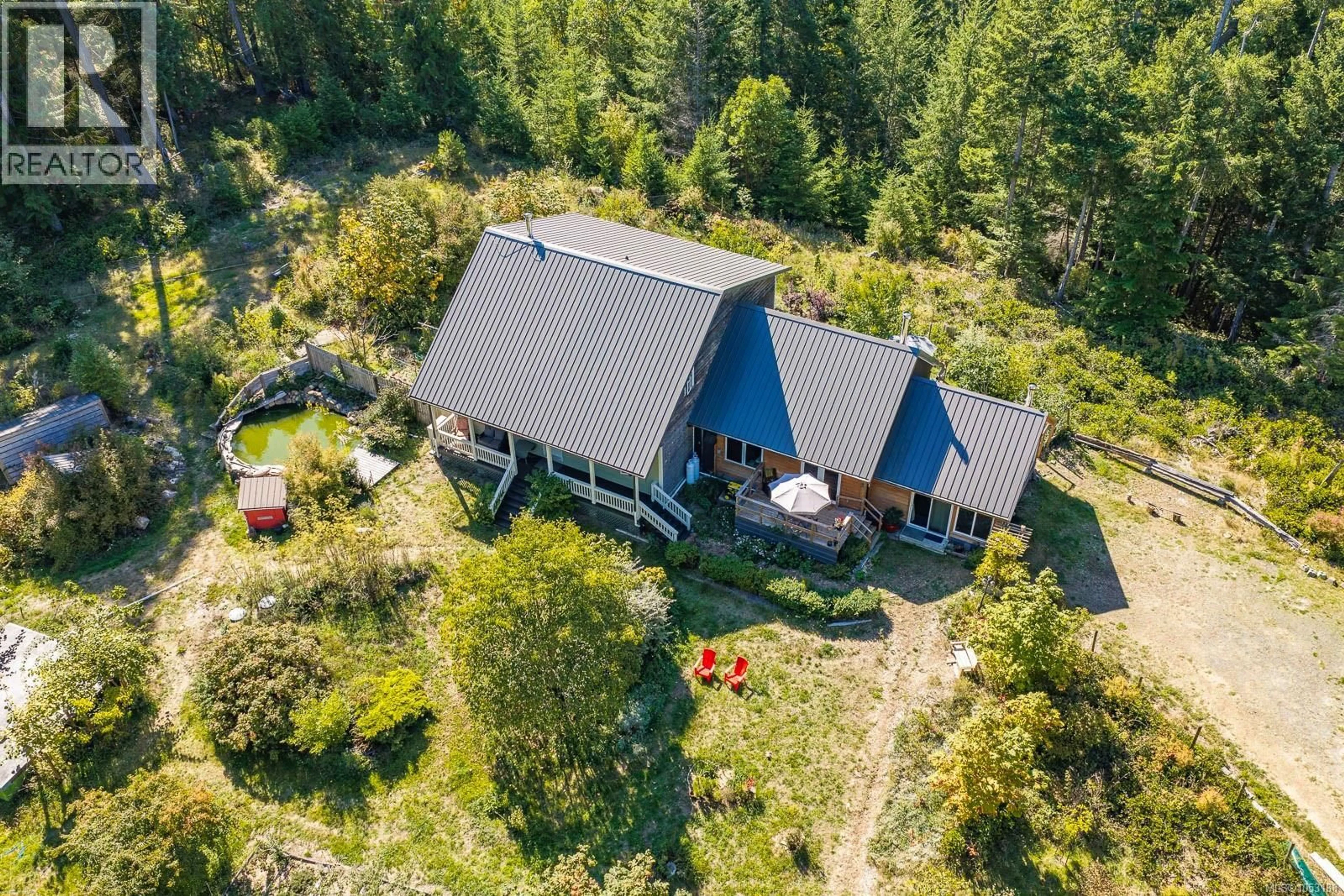 A pic from outside/outdoor area/front of a property/back of a property/a pic from drone, unknown for 10225 GREENHILL ROAD, Denman Island British Columbia V0R1T0