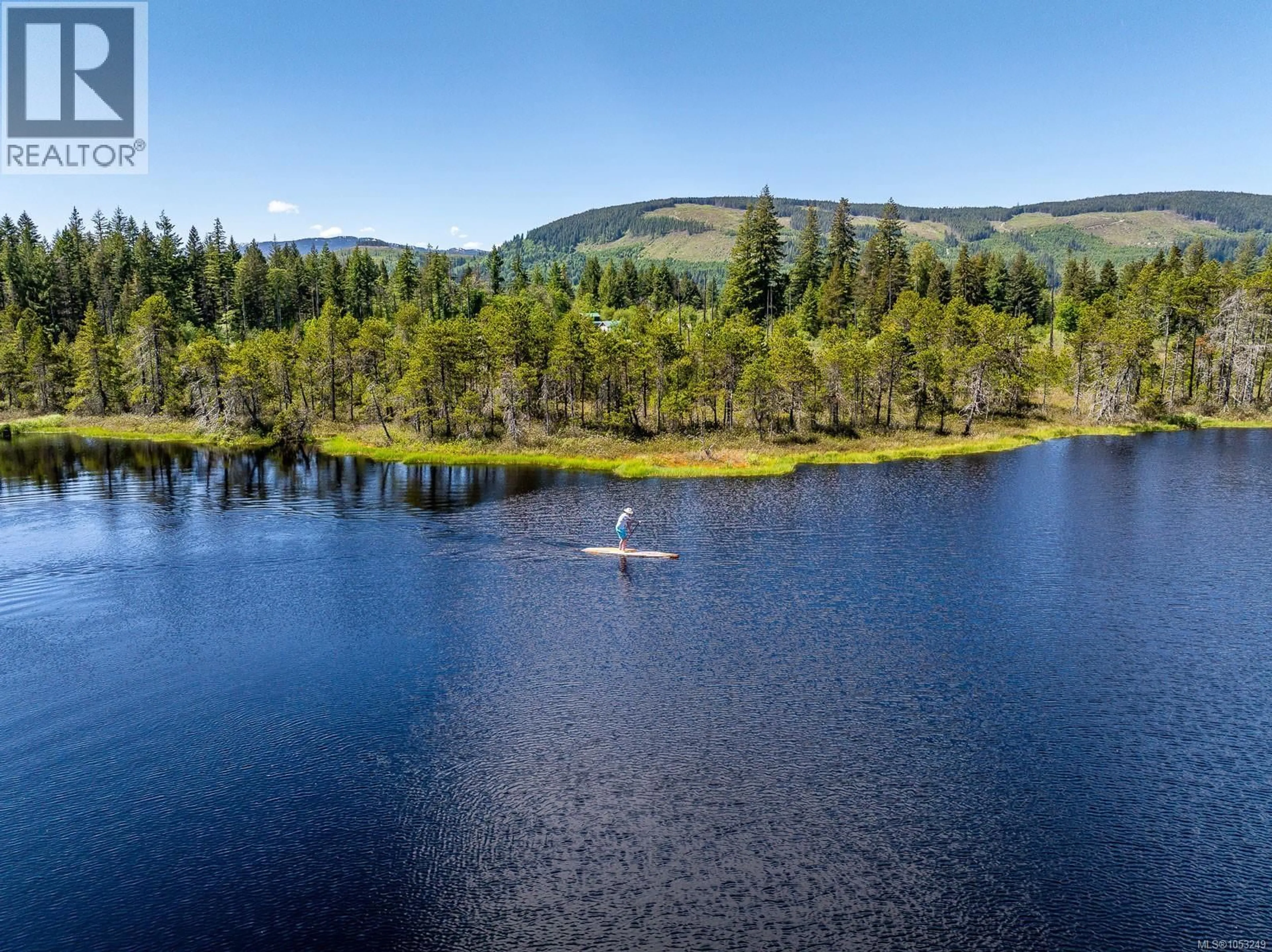 A pic from outside/outdoor area/front of a property/back of a property/a pic from drone, water/lake/river/ocean view for 2030 SPIKE ROAD, Merville British Columbia V9J1N5