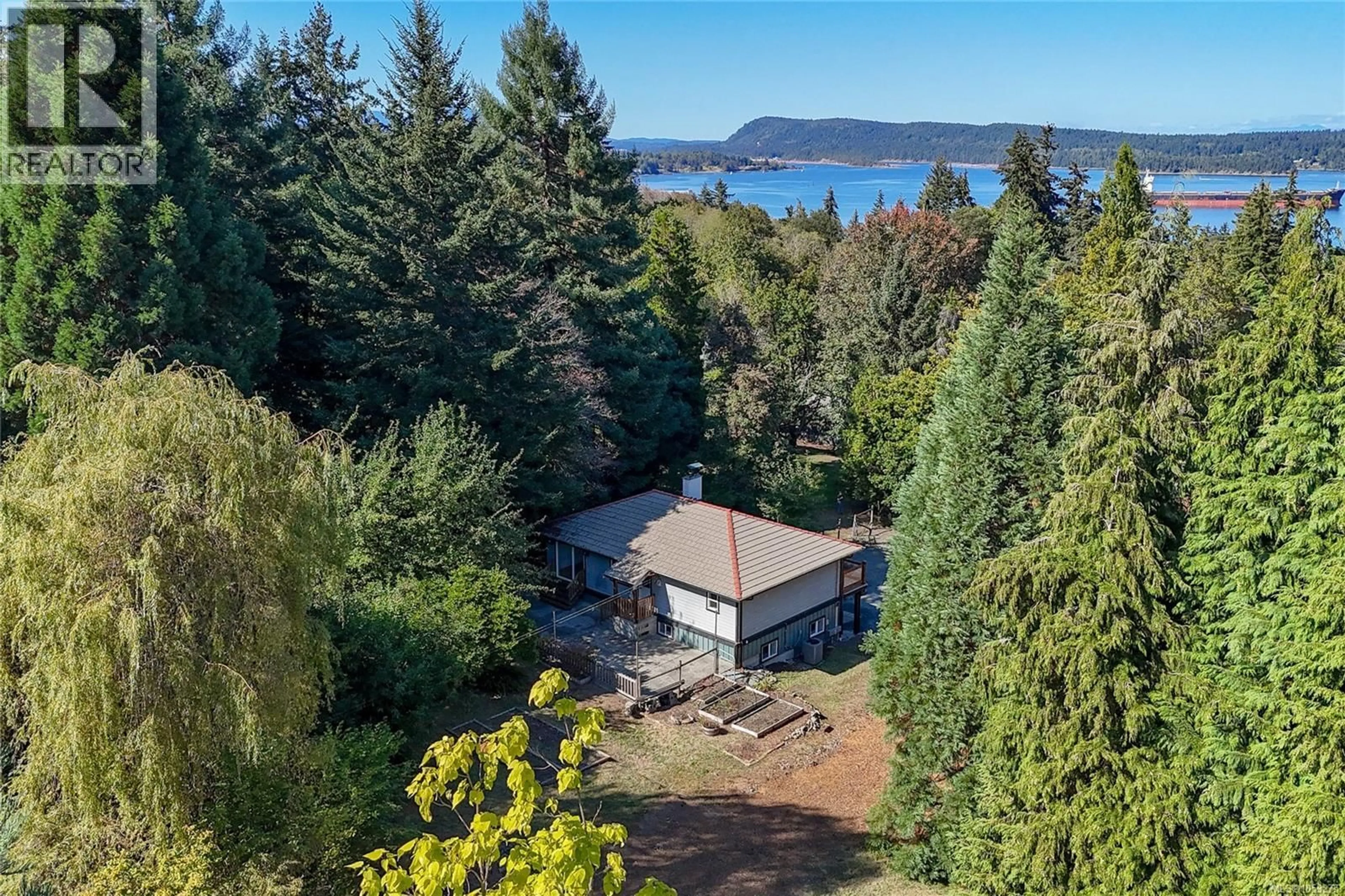 A pic from outside/outdoor area/front of a property/back of a property/a pic from drone, water/lake/river/ocean view for 11196 NORTH WATTS ROAD, Saltair British Columbia V9G1Y6