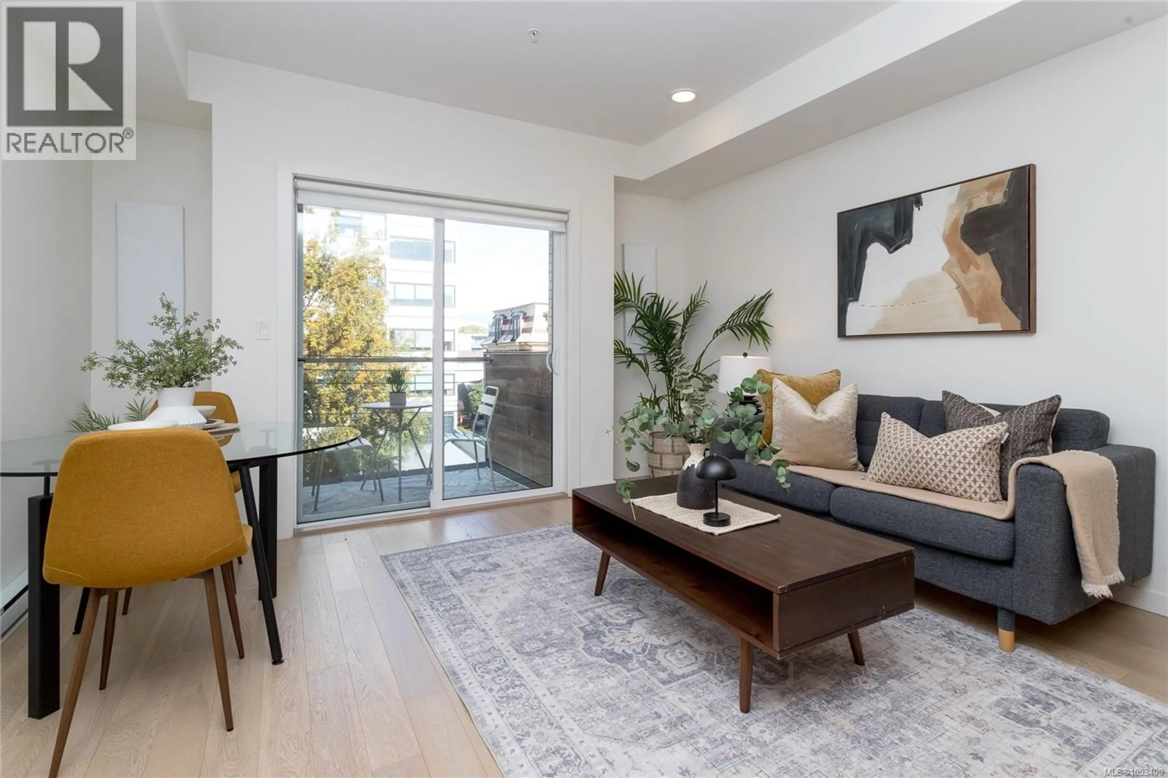 Living room with furniture, unknown for 313 - 1033 COOK STREET, Victoria British Columbia V8V0E1