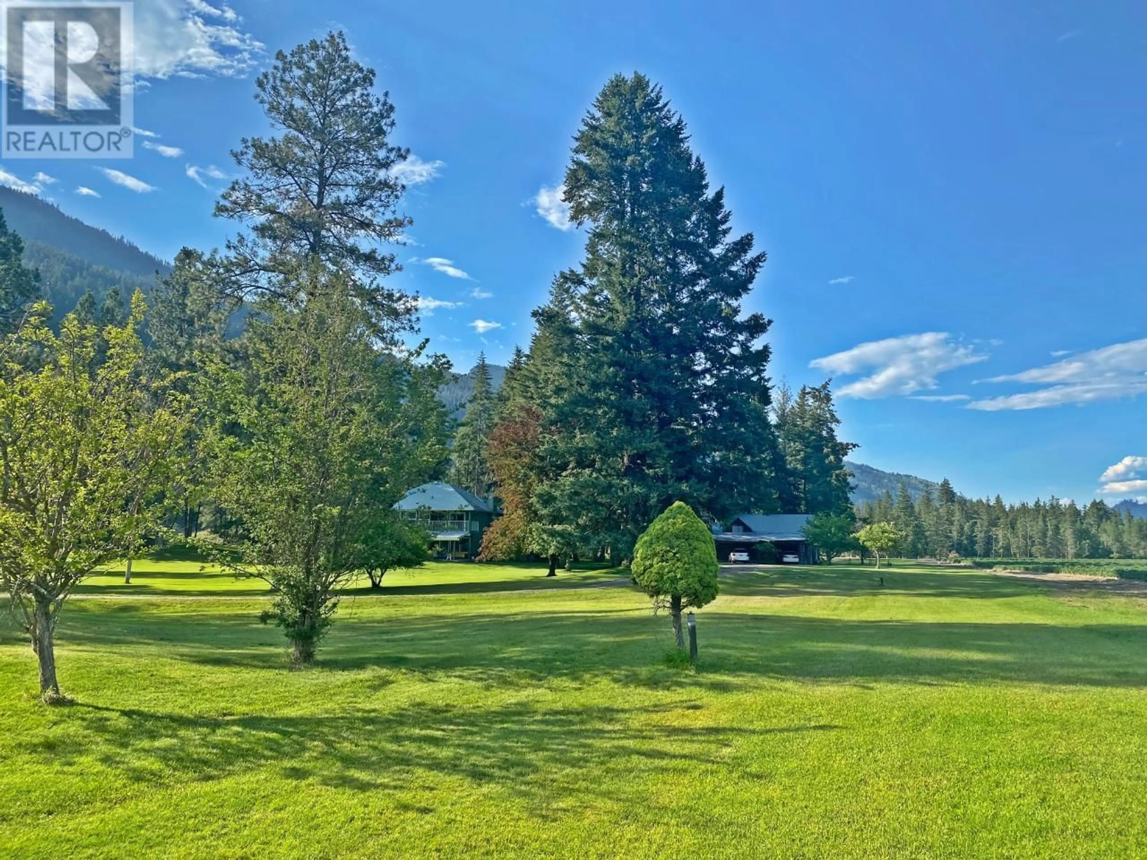 A pic from exterior of the house or condo, the fenced backyard for 2 MCLURE FERRY Road, McLure British Columbia V0E2H0