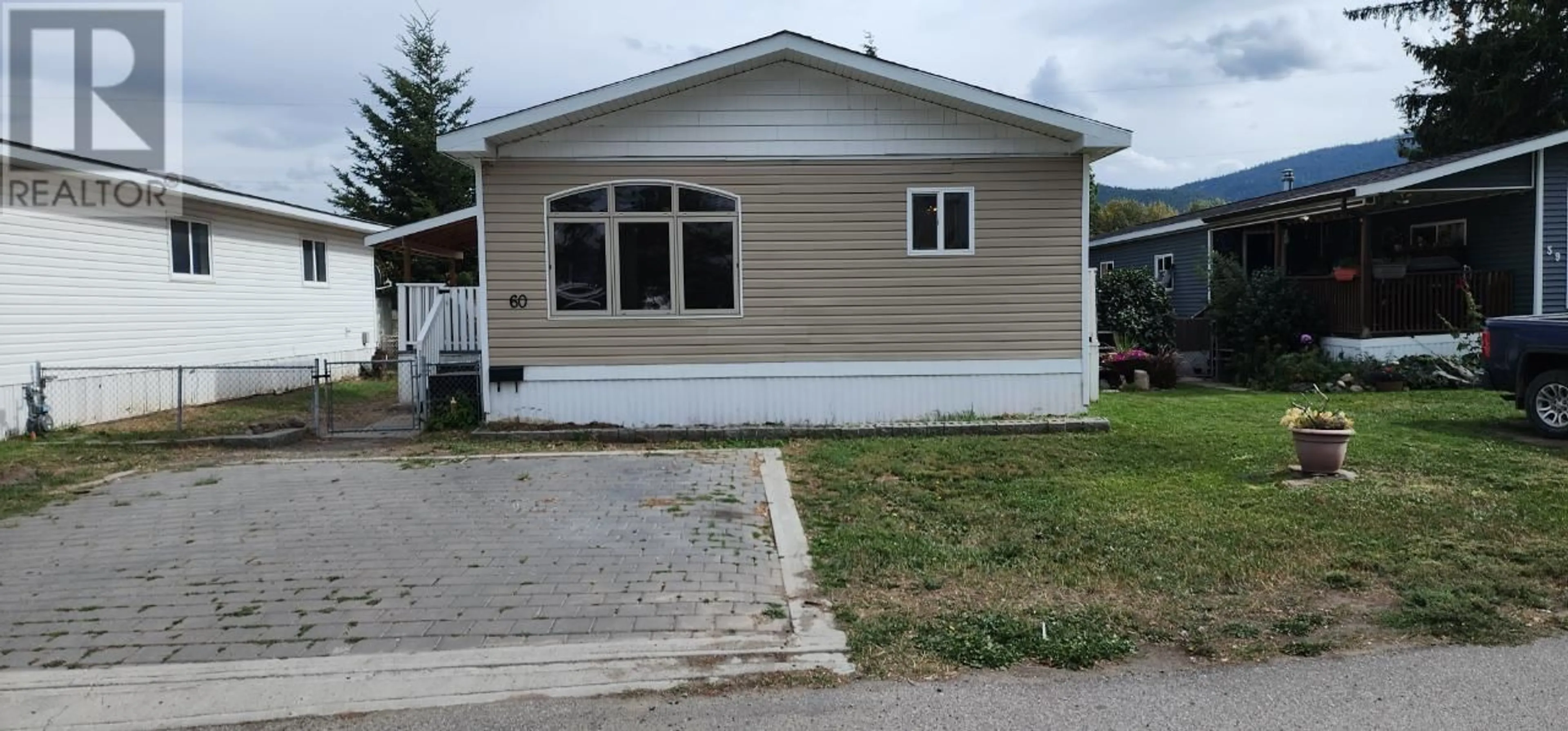 Frontside or backside of a home for 60-2776 CLAPPERTON AVE, Merritt British Columbia