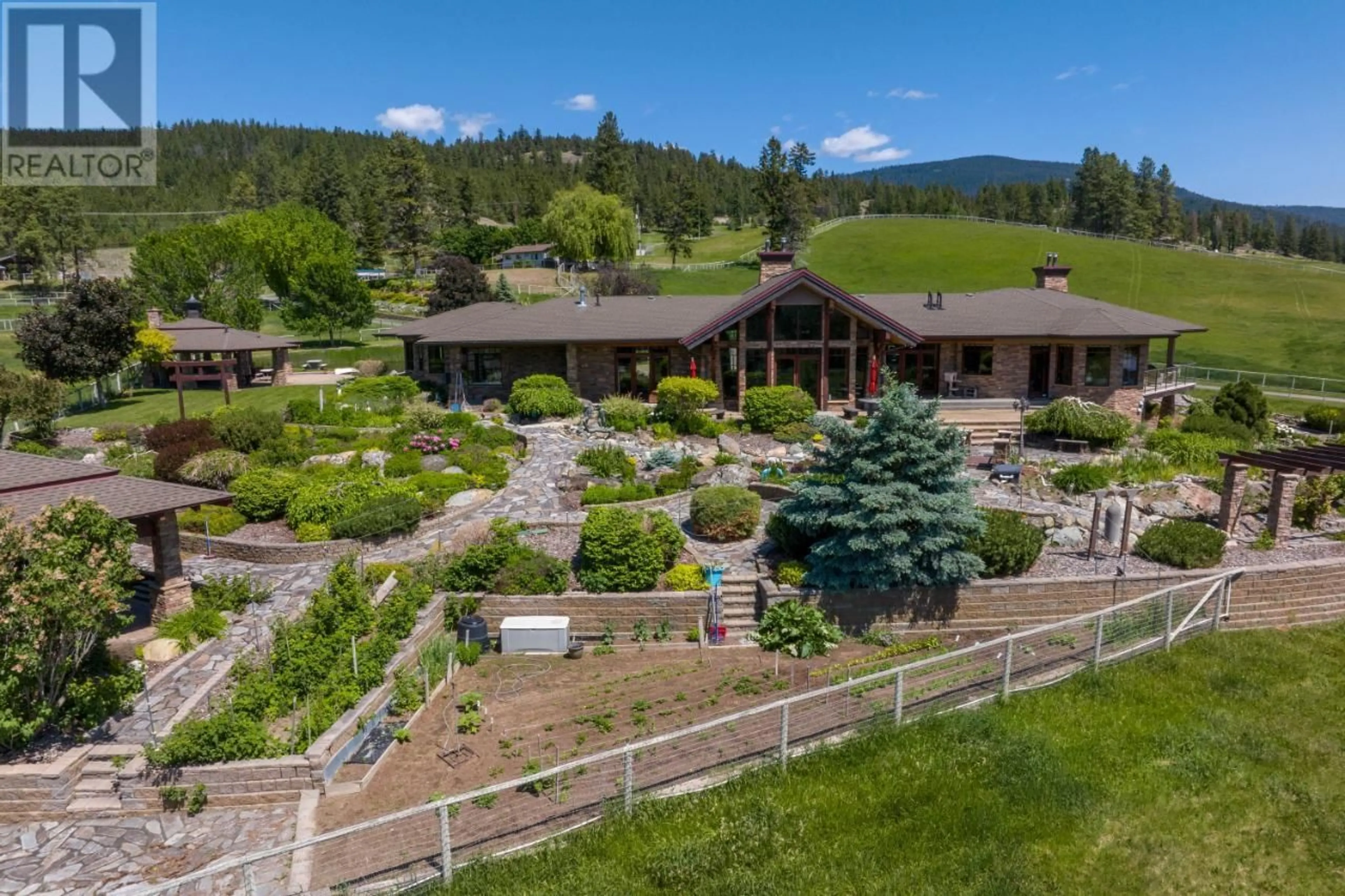 A pic from exterior of the house or condo, the fenced backyard for 1060 HEFFLEY LOUIS CR Road, Sun Peaks British Columbia V0E1Z1