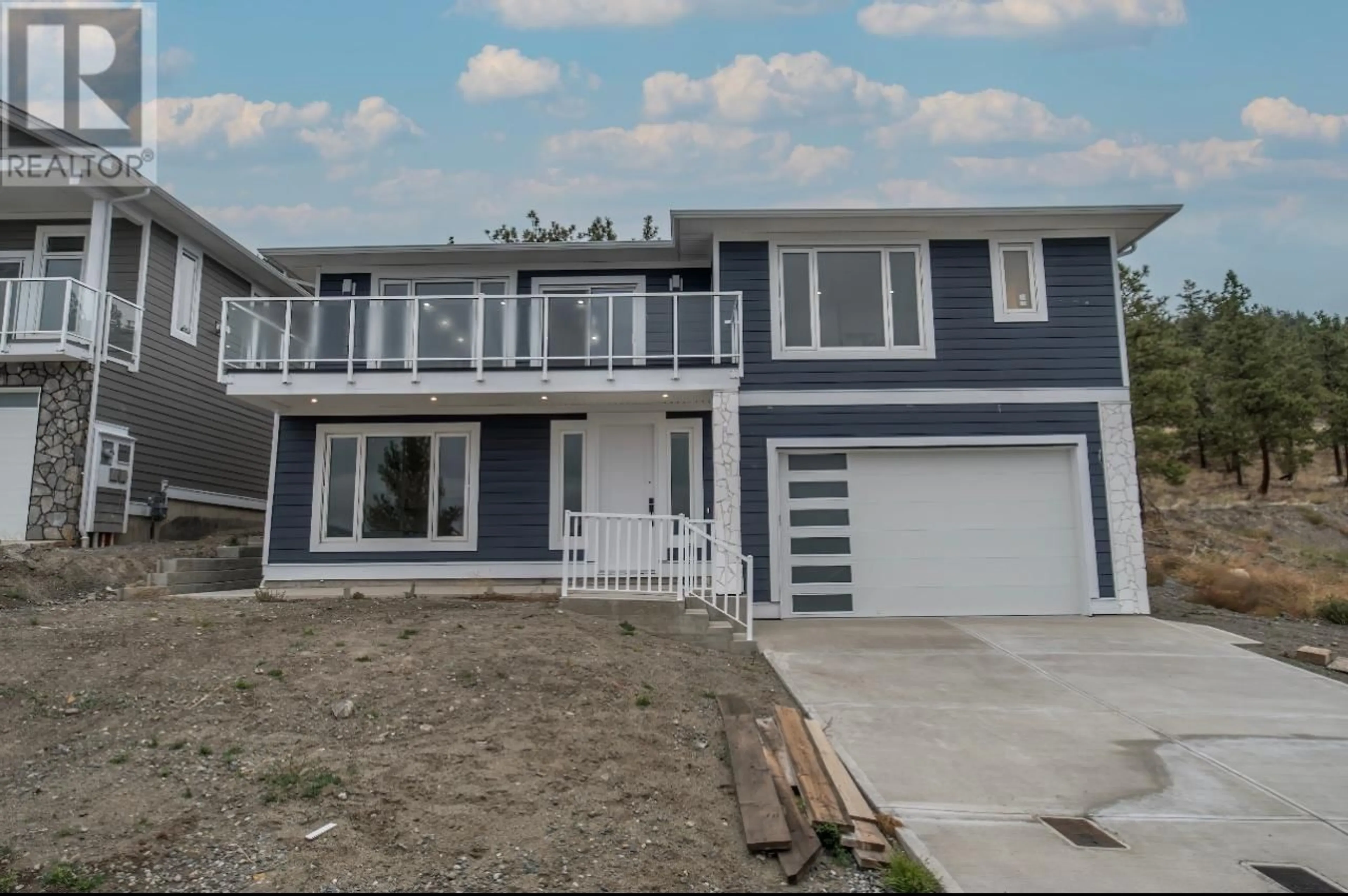 Frontside or backside of a home for 2737 PEREGRINE WAY, Merritt British Columbia V1K0B4