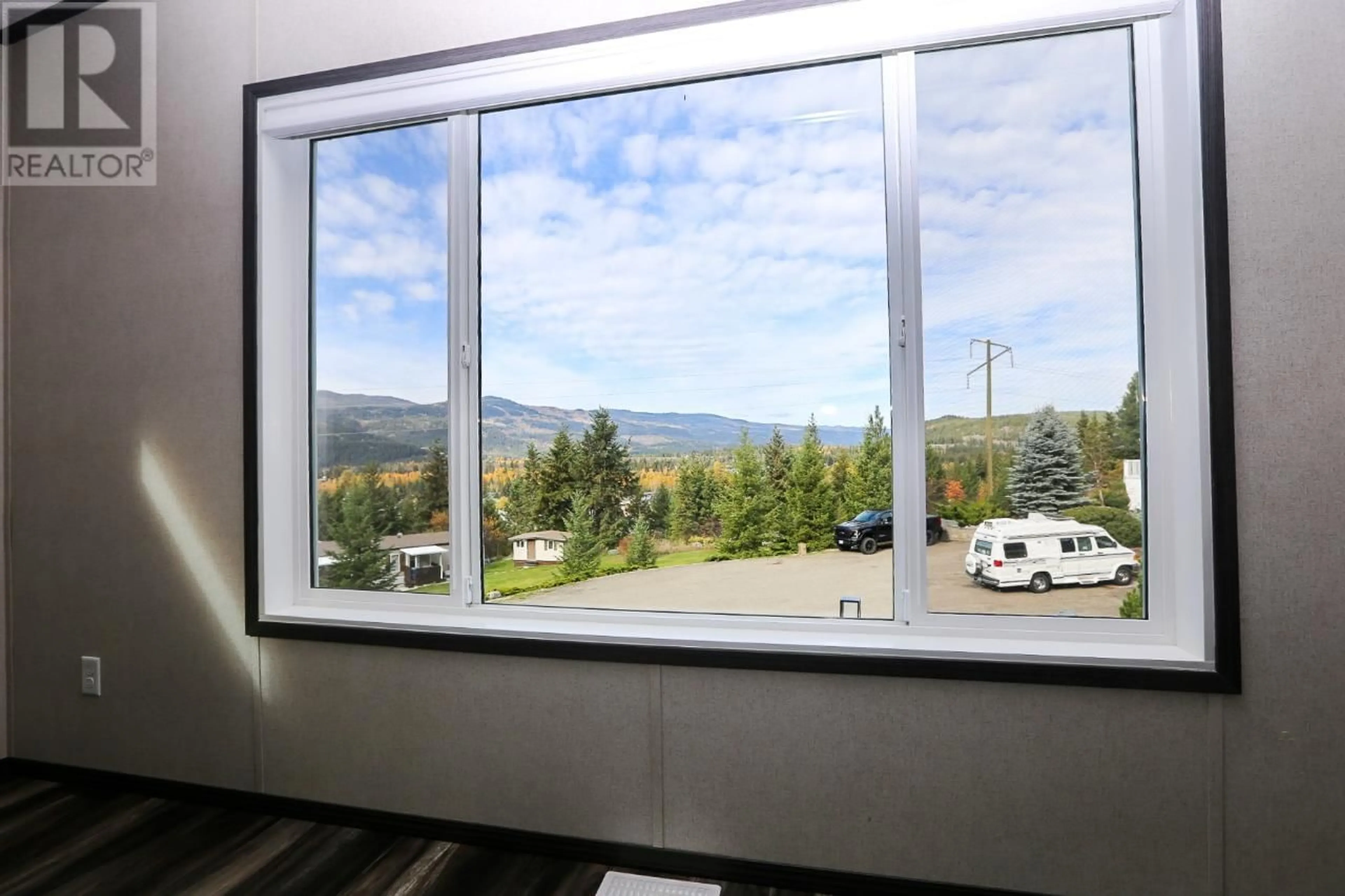 Patio, the fenced backyard for 4510 POWER Road Unit# 46, Barriere British Columbia V0E1E0