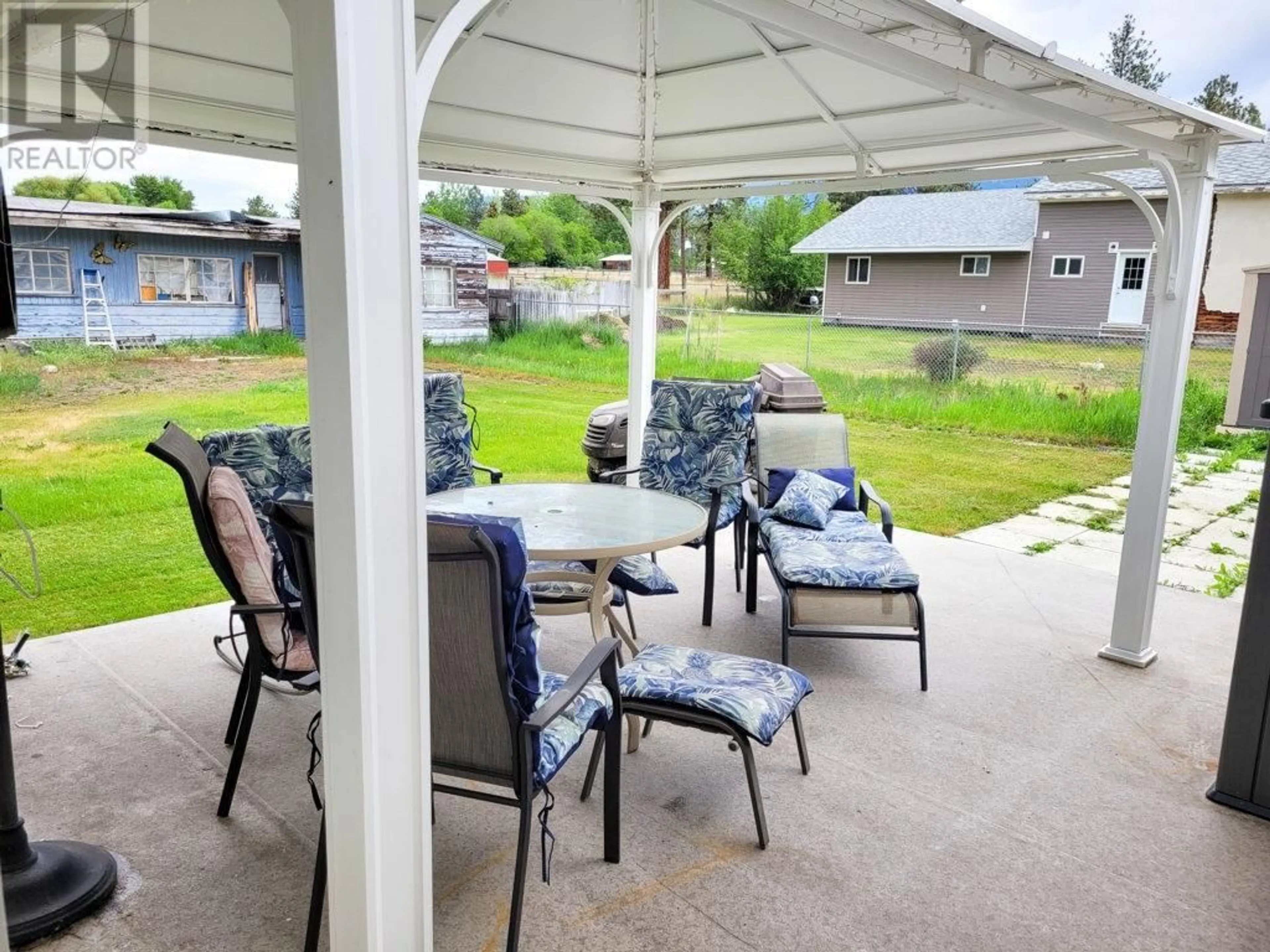 Patio, the fenced backyard for 463 MORGAN Avenue, Merritt British Columbia V1K1B8