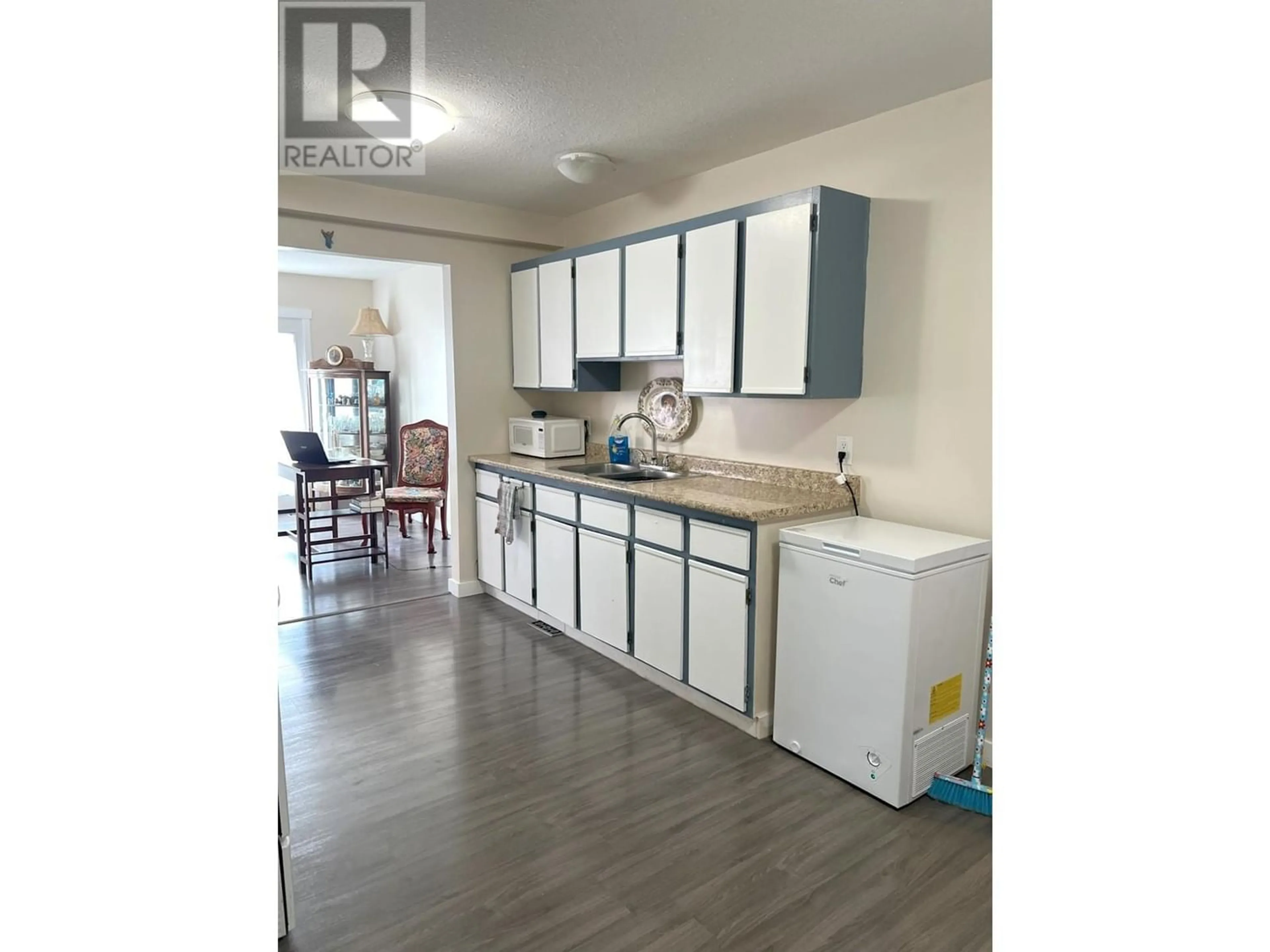 Kitchen, cement floor for 2168 CLARKE Avenue, Merritt British Columbia V1K1B8