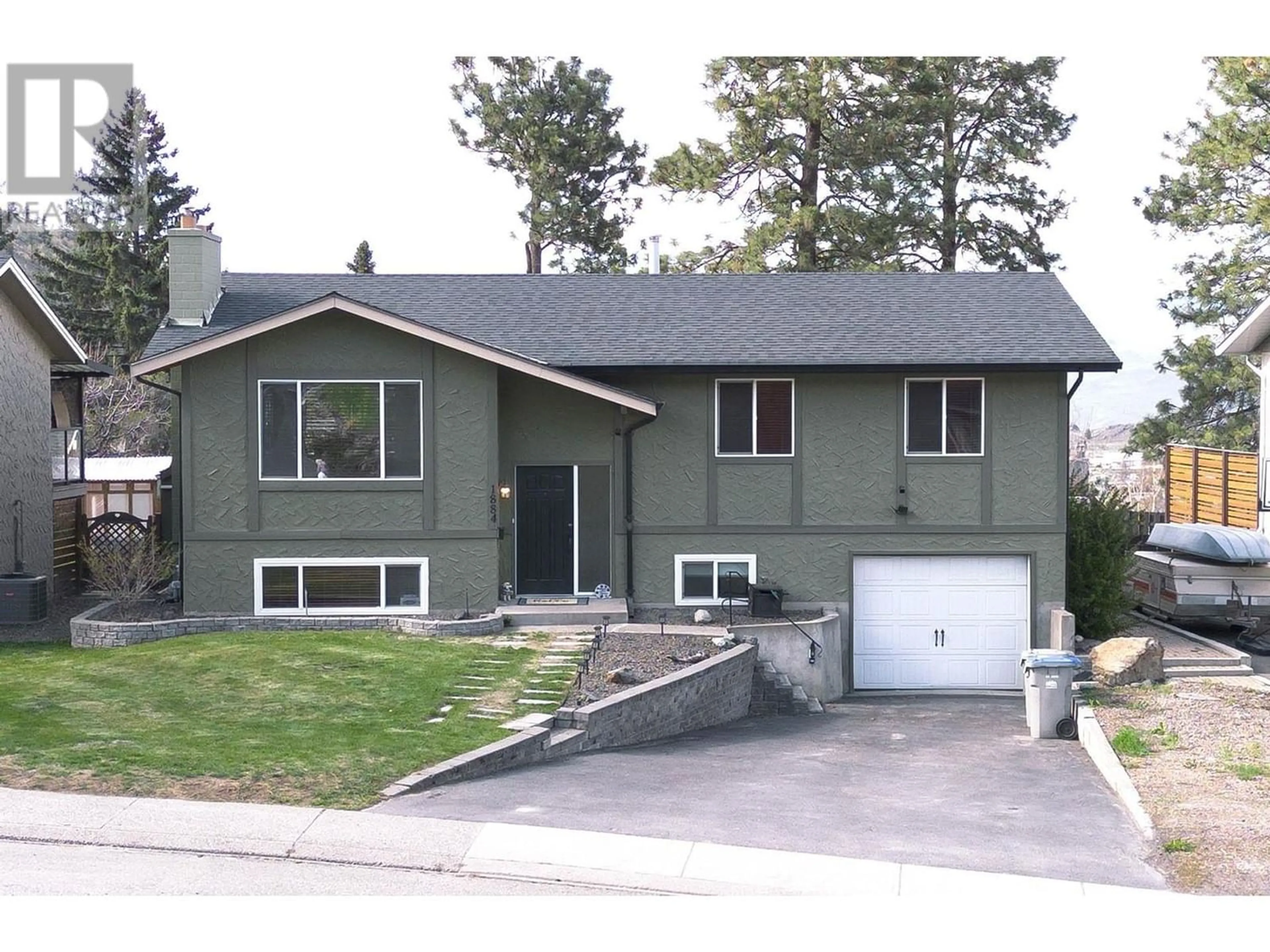 Frontside or backside of a home for 1884 SPRINGHILL DRIVE, Kamloops British Columbia V2E1J3