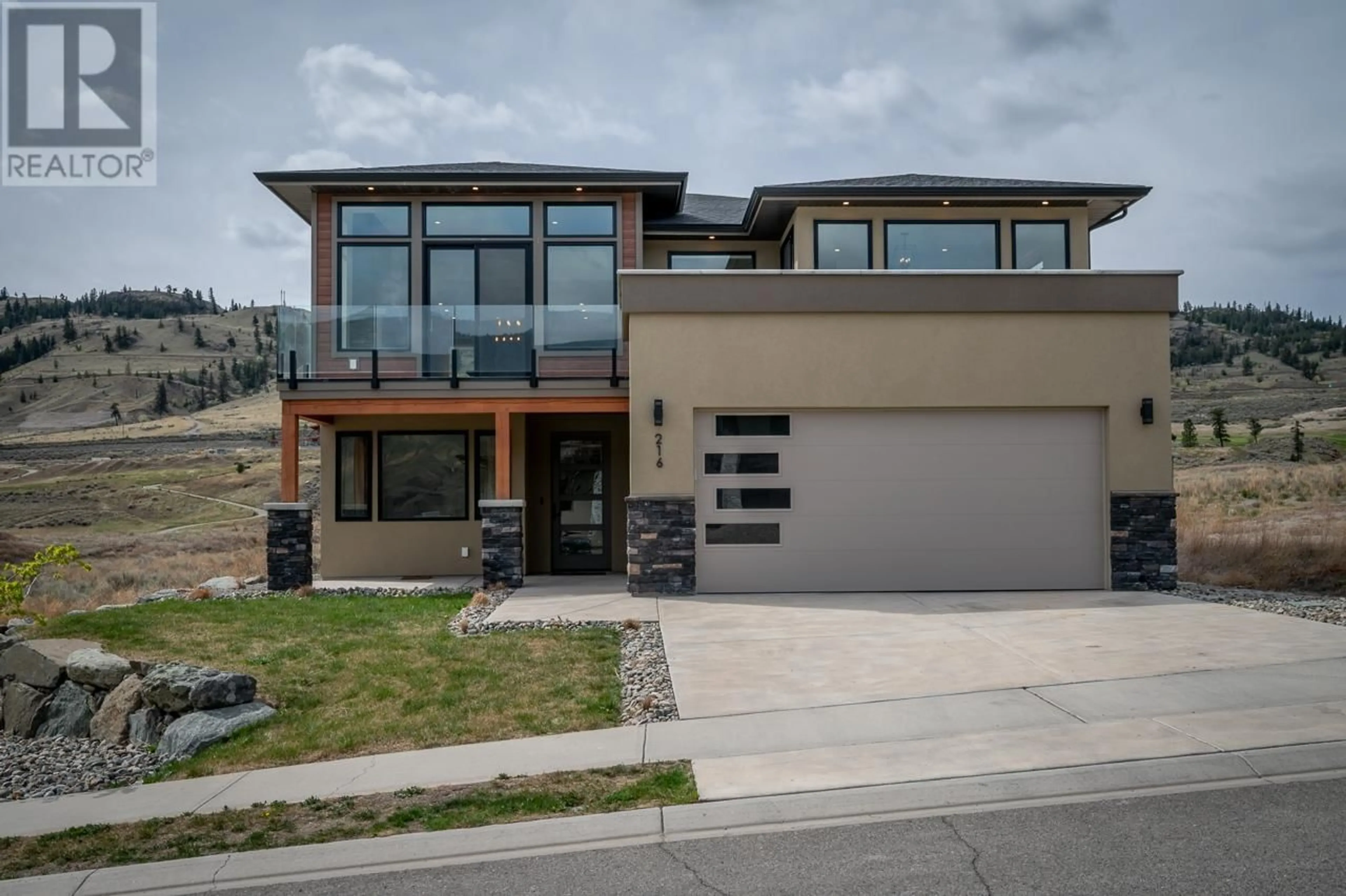 Frontside or backside of a home for 216 HOLLOWAY DRIVE, Tobiano British Columbia V1S0B3