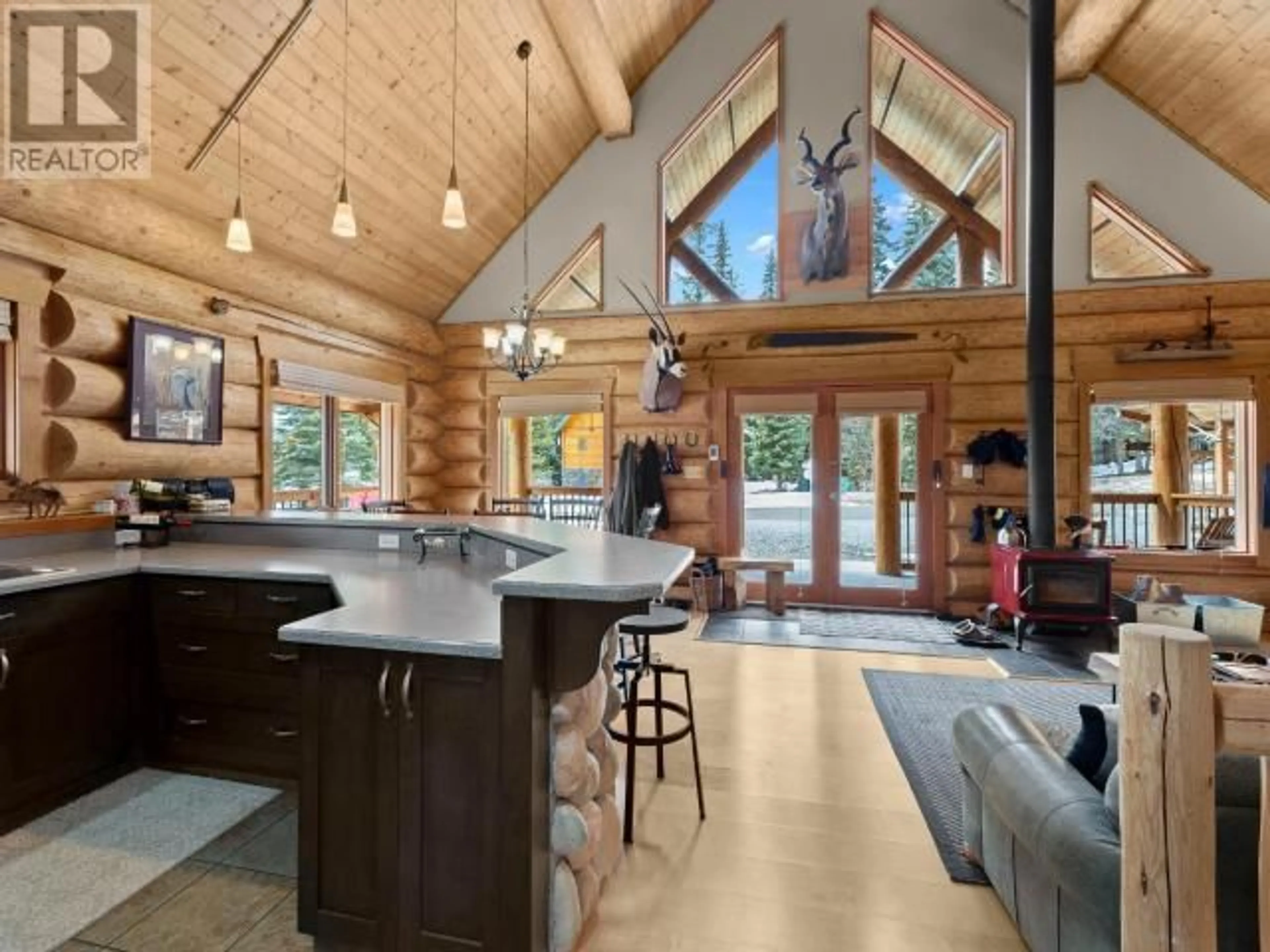 Open concept kitchen, wood/laminate floor for 4810 PINE RIDGE WAY, Logan Lake British Columbia V0K1W0